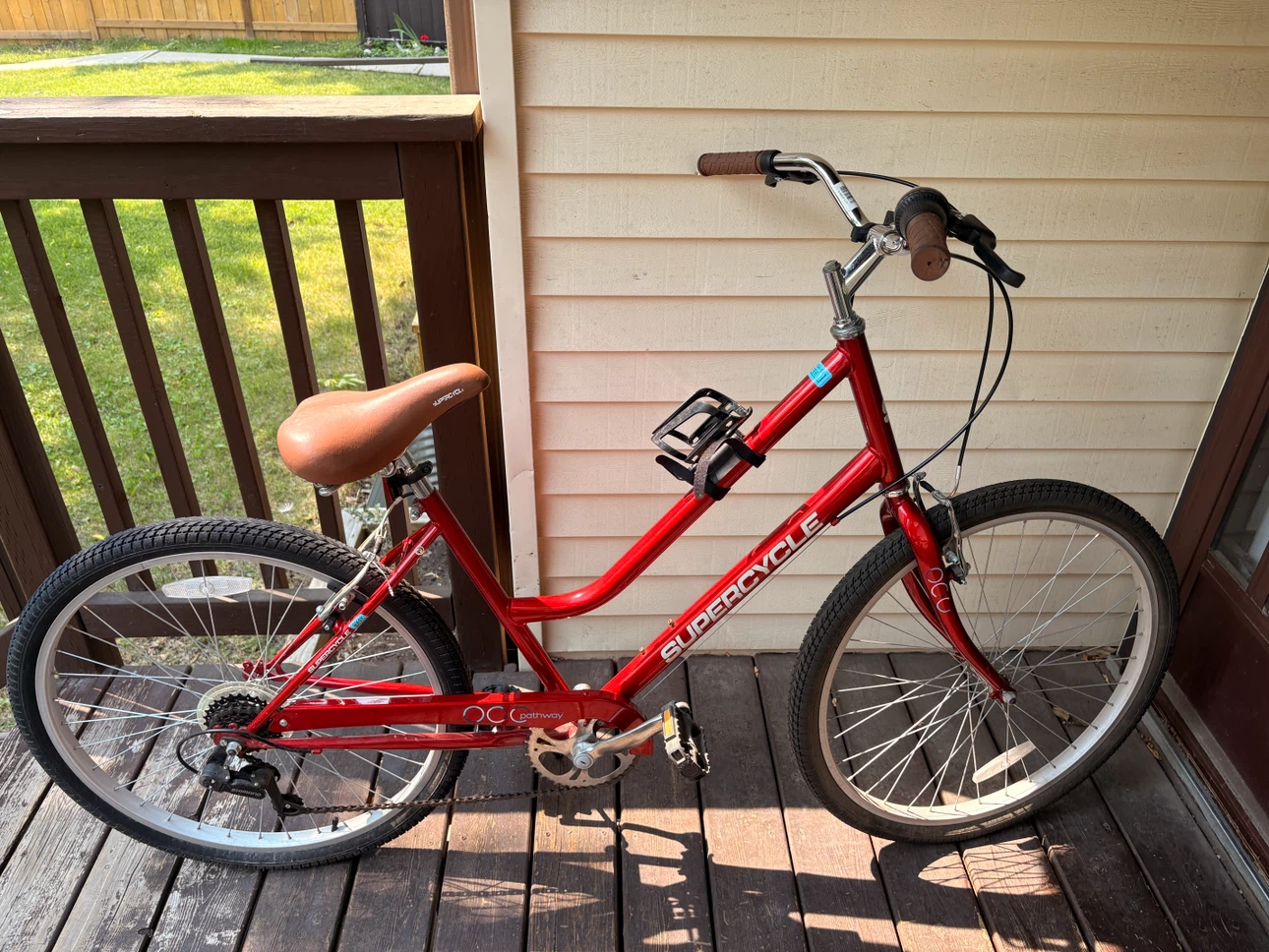 Supercycle pathway and Scrambler bicycle with helmets