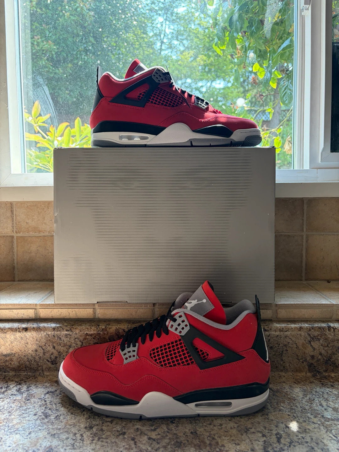 Air Jordan 4 "Red Thunder" Sneakers
