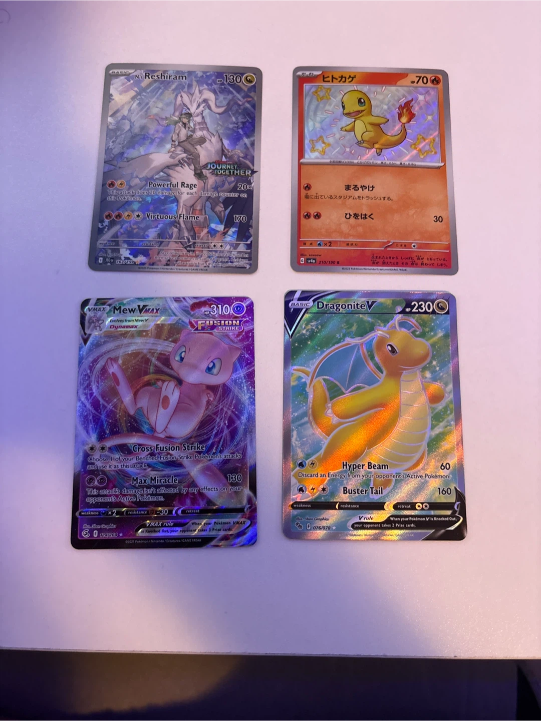 Pokemon Trading Cards: Reshiram, Charmander, Mew, Dragonite