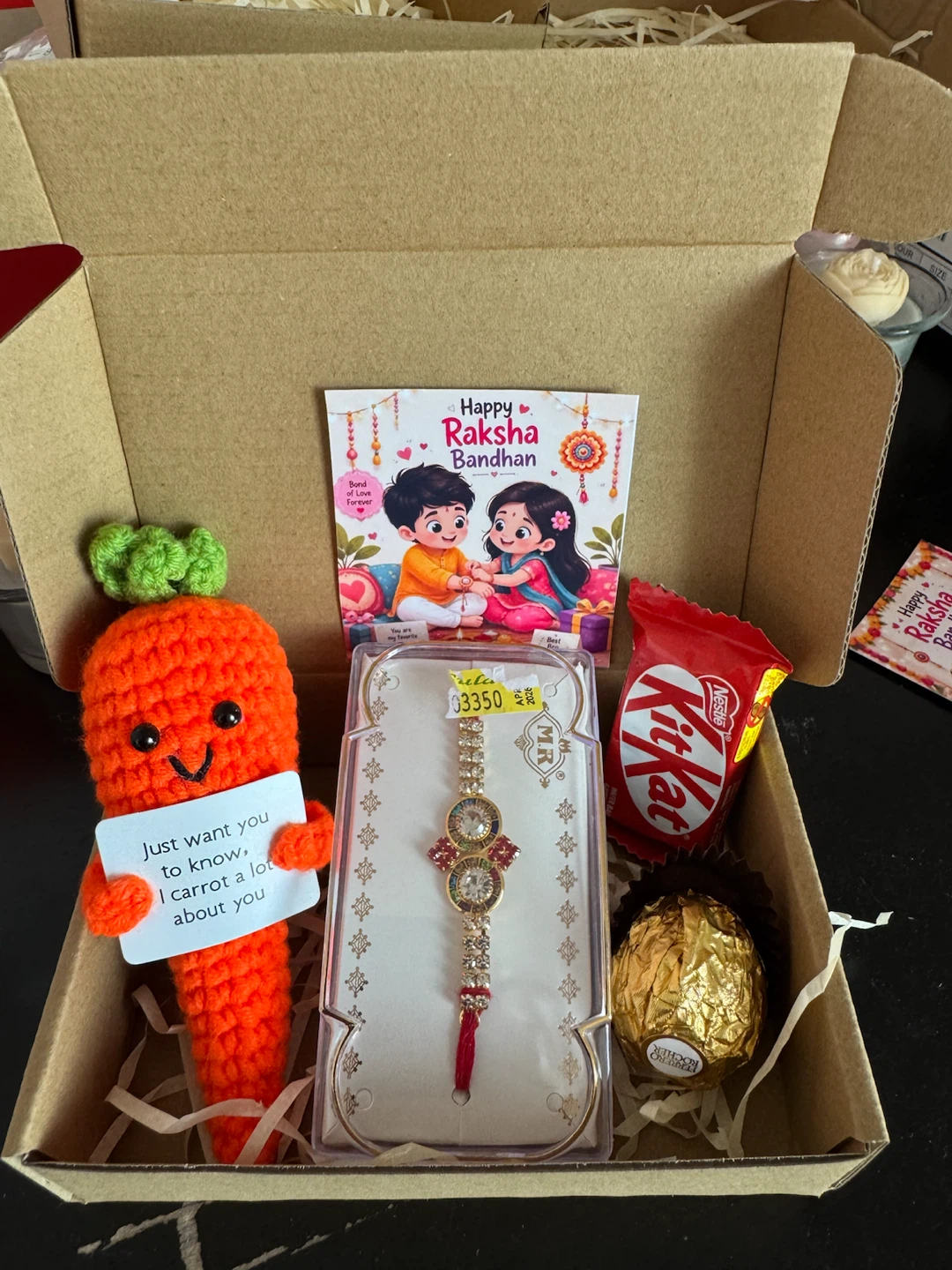 Happy Raksha Bandhan Gift Box with Rakhi, Chocolate & Carrot Toy