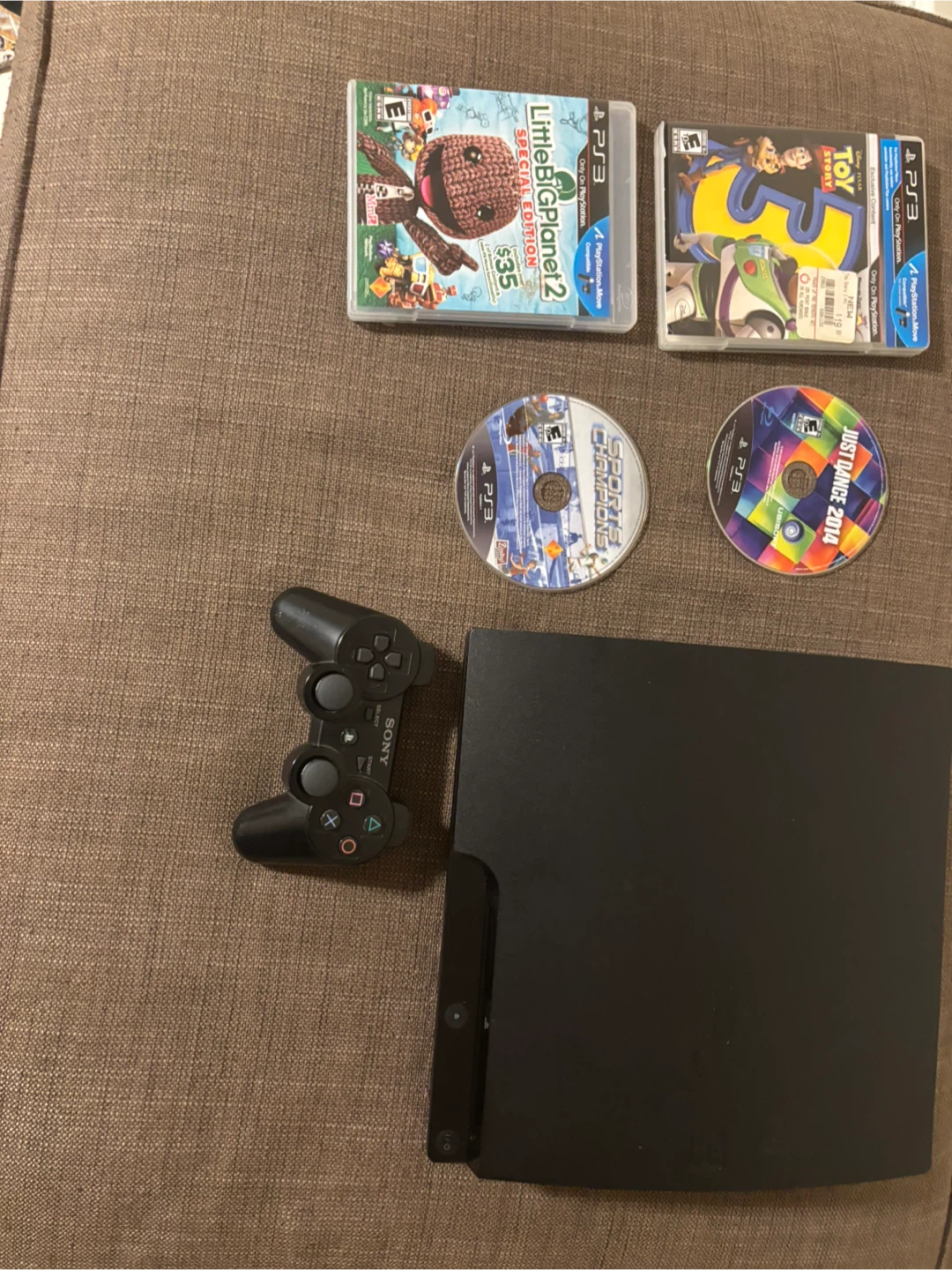 PlayStation 3 Console Bundle with 4 Games and Controller