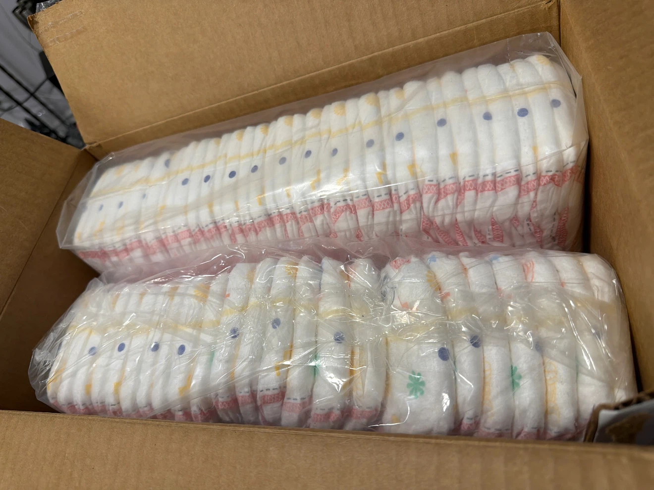 Size 8 diapers. 74 diapers. Box opened sleeves sealed