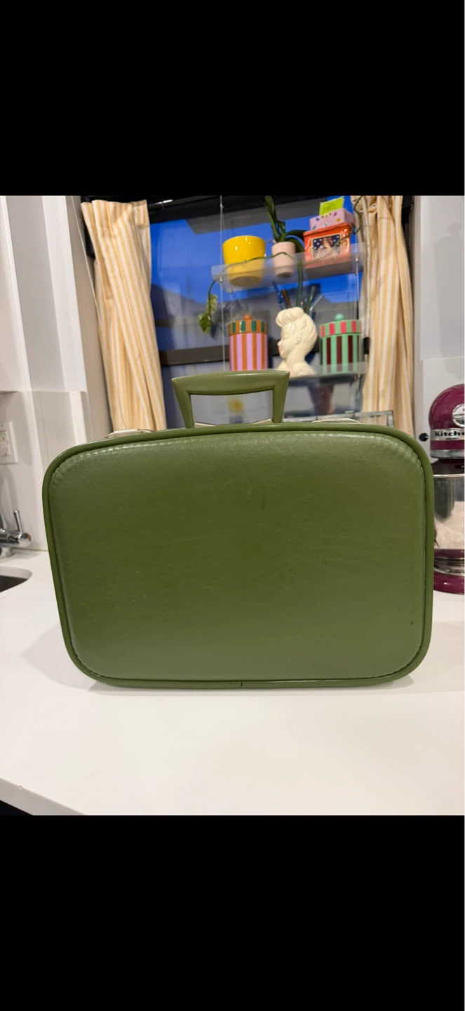 Green vintage suitcase