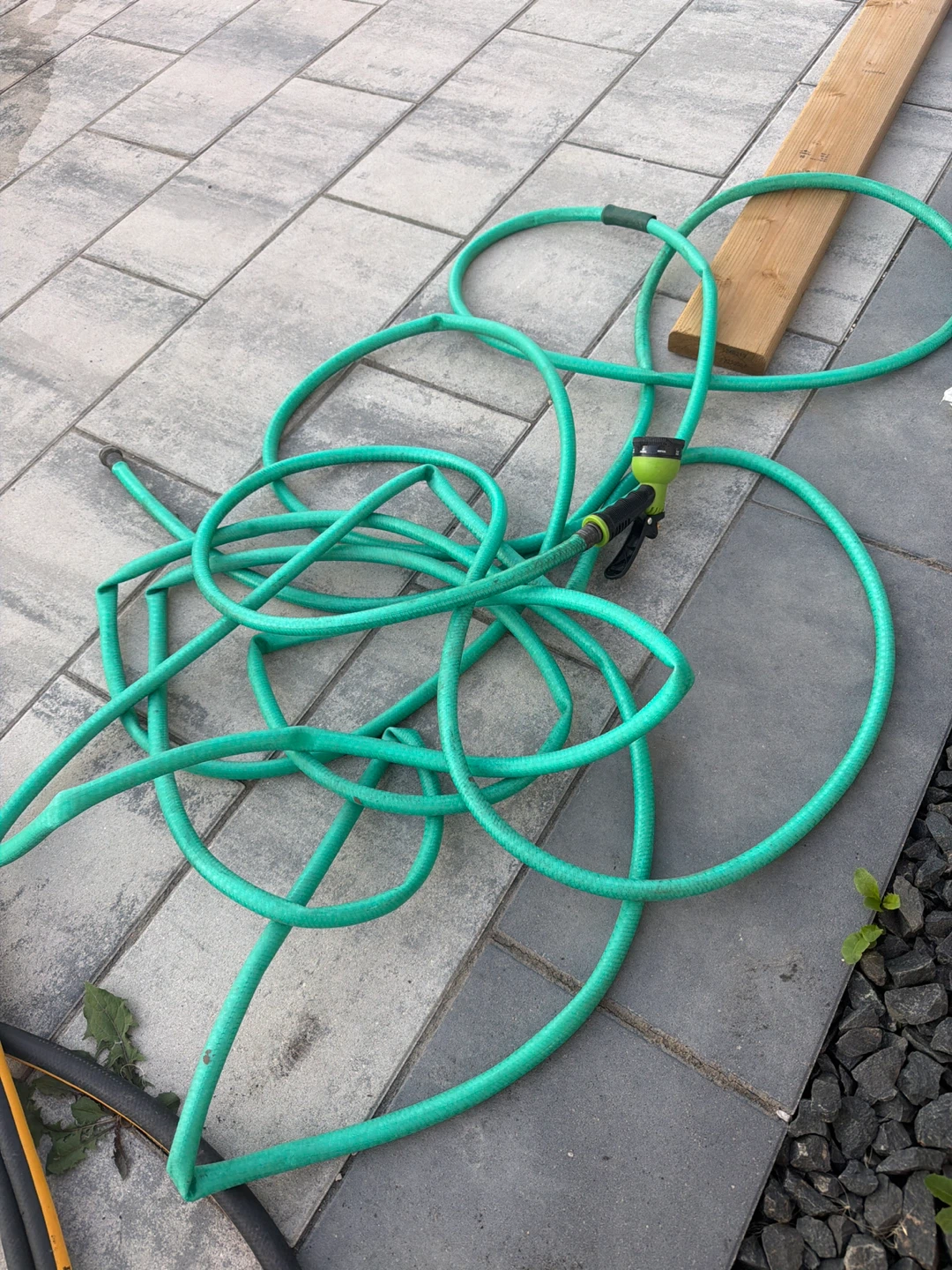 Green Garden Hose with Spray Nozzle