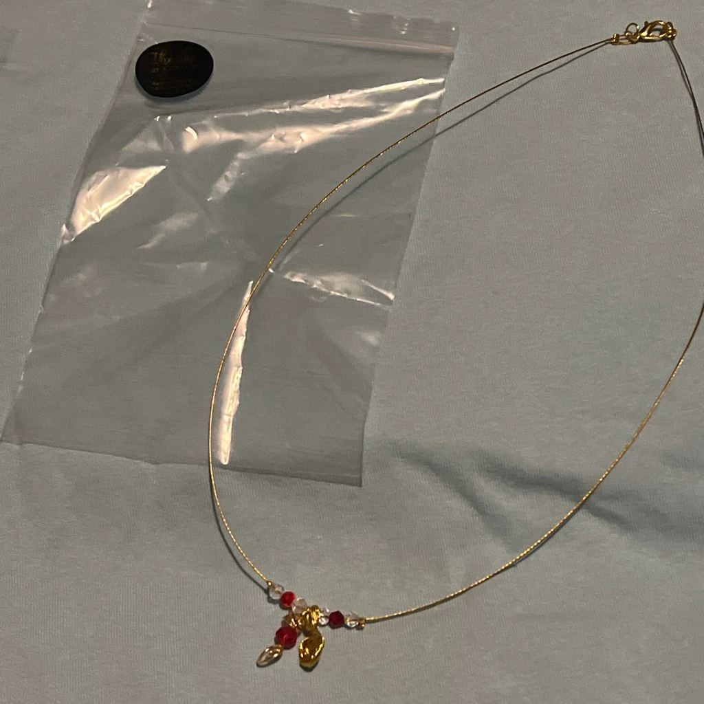Gold Tone Necklace with Red Beads