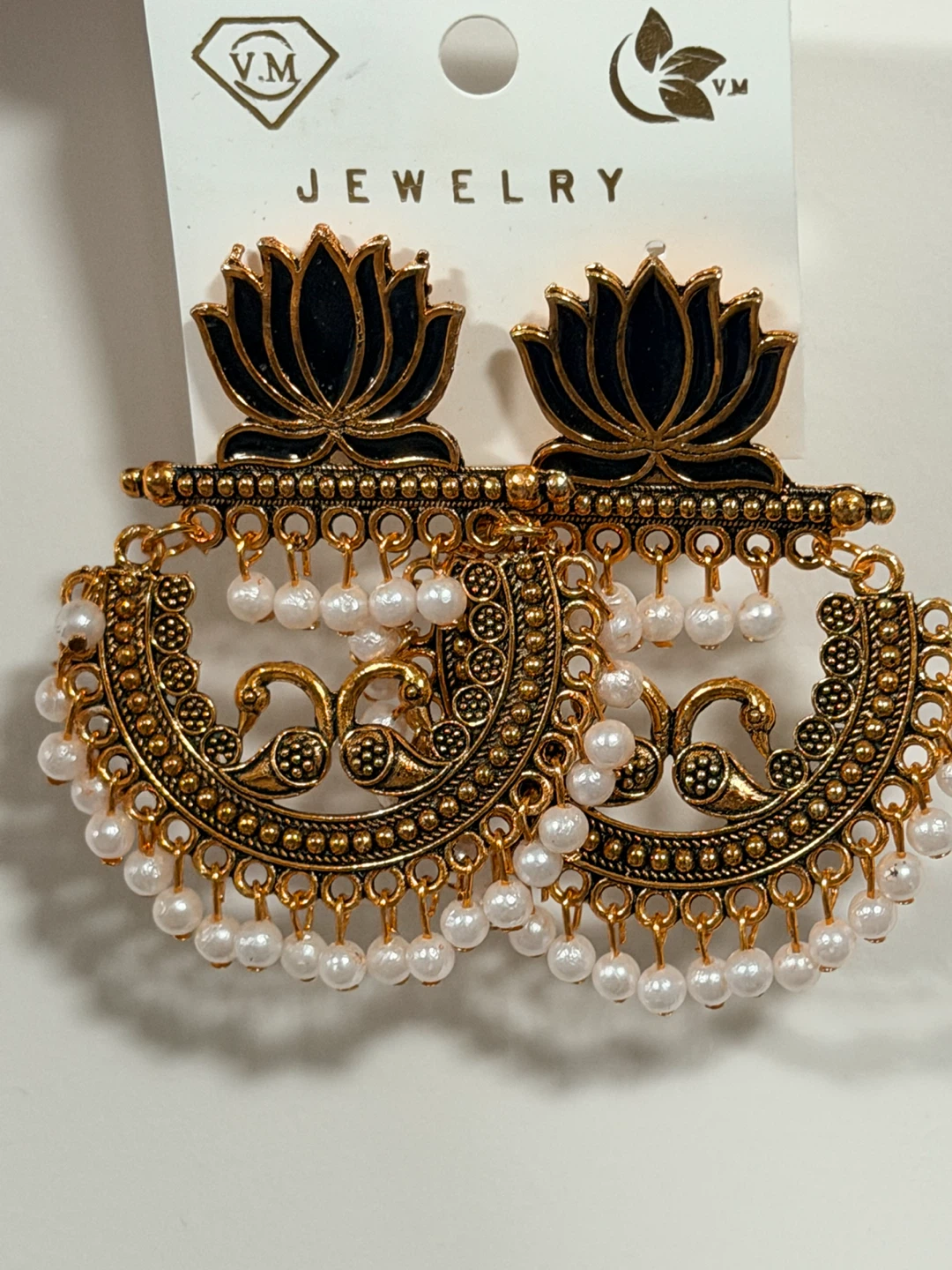 Gold Tone Dangle Earrings with Lotus and Peacock Design