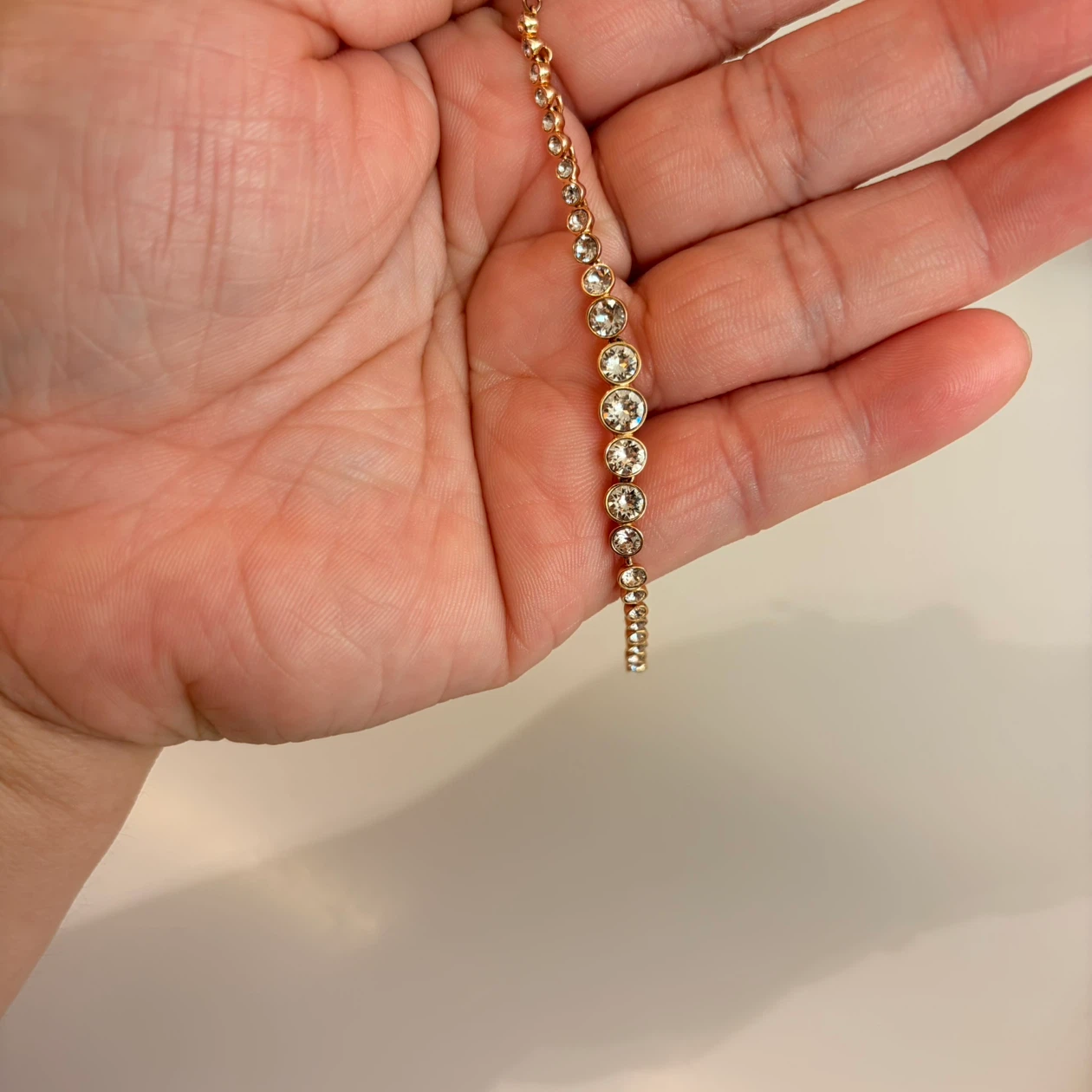 Swarovski gold bracelet w/diamonds
