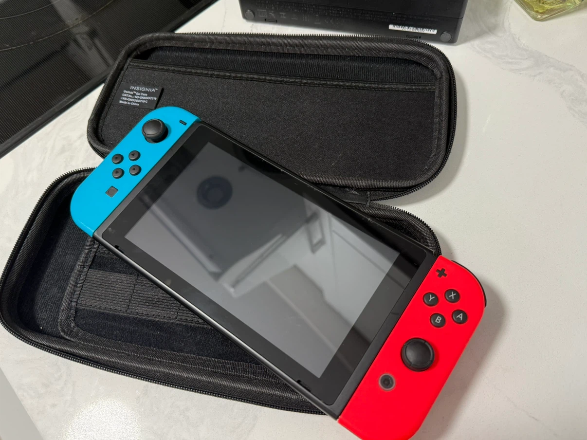 Nintendo Switch Console with Games and Accessories - photo 2