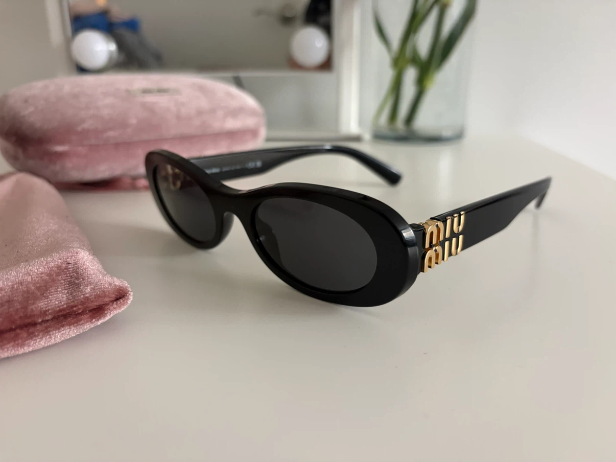 Miu Miu Black Oval Sunglasses