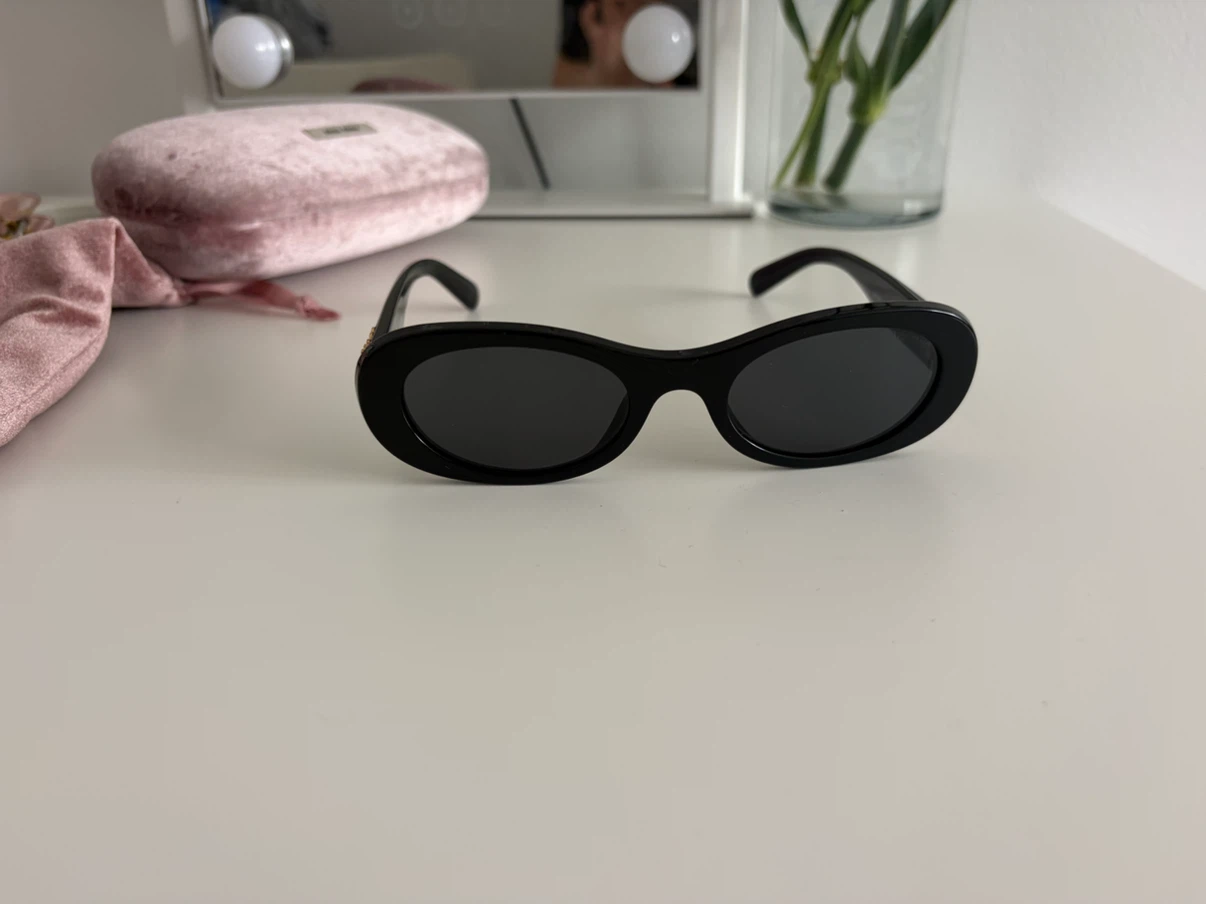 Miu Miu Black Oval Sunglasses - photo 4