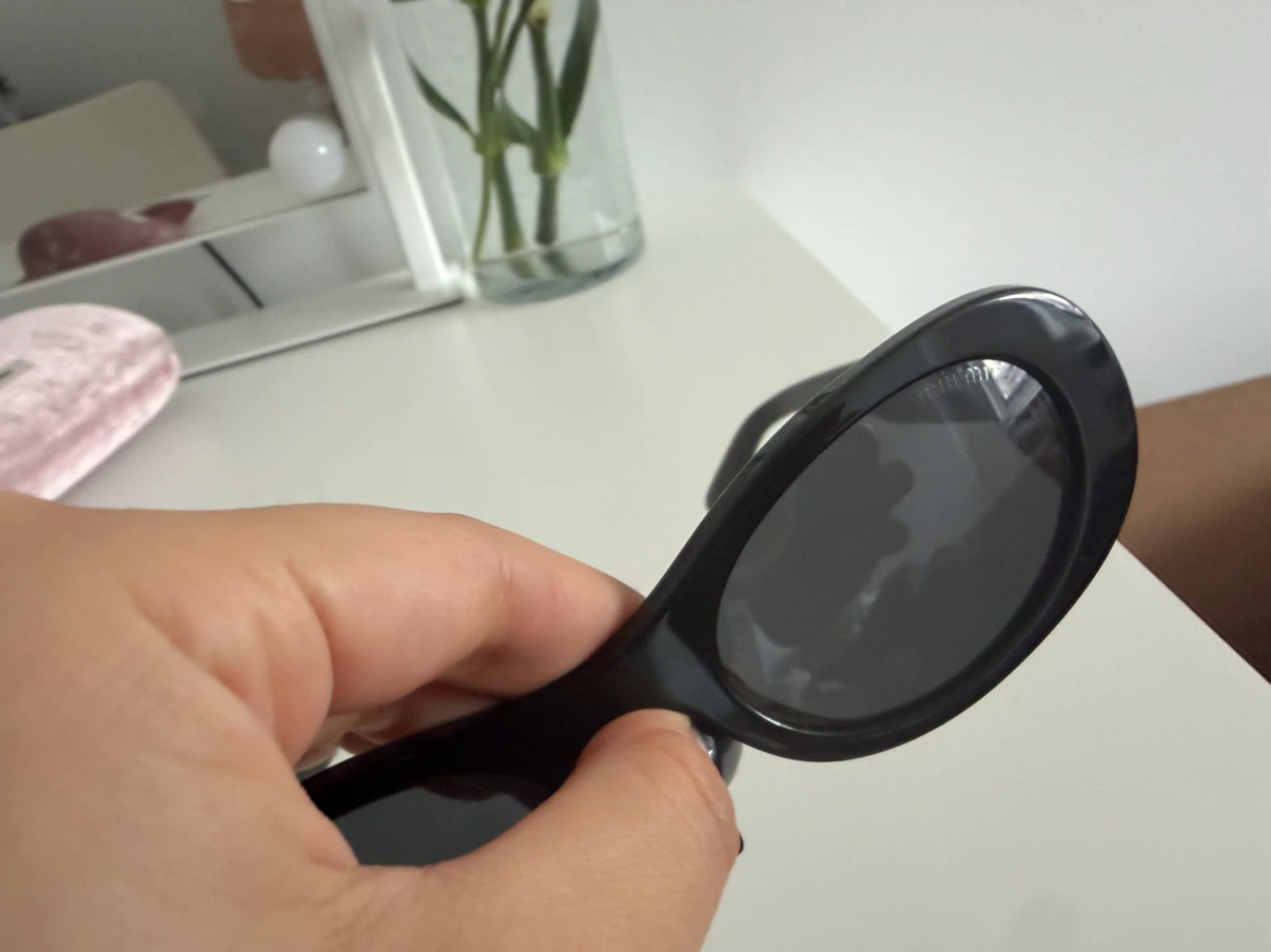 Miu Miu Black Oval Sunglasses - photo 5