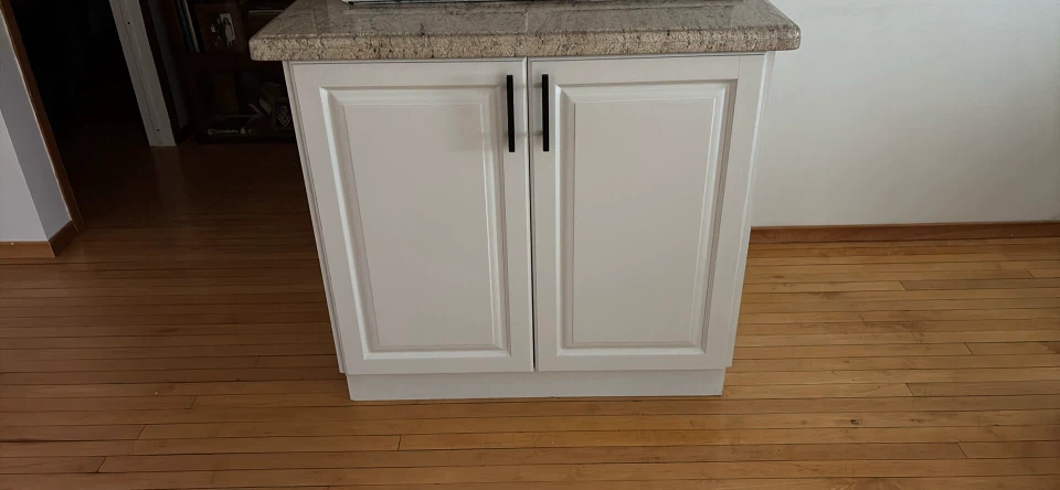White Kitchen Island with Granite Countertop