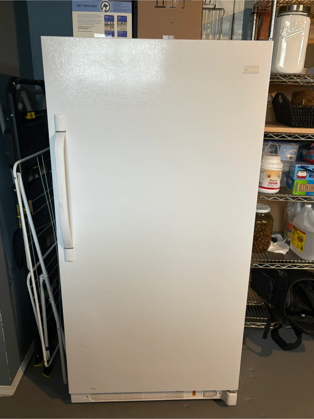 White Frigidaire upright Freezer