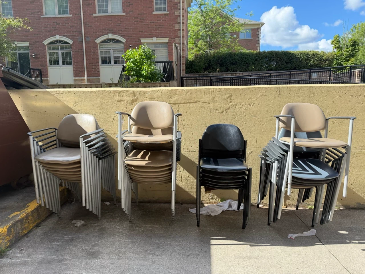 Stacking Chairs - Black and Tan