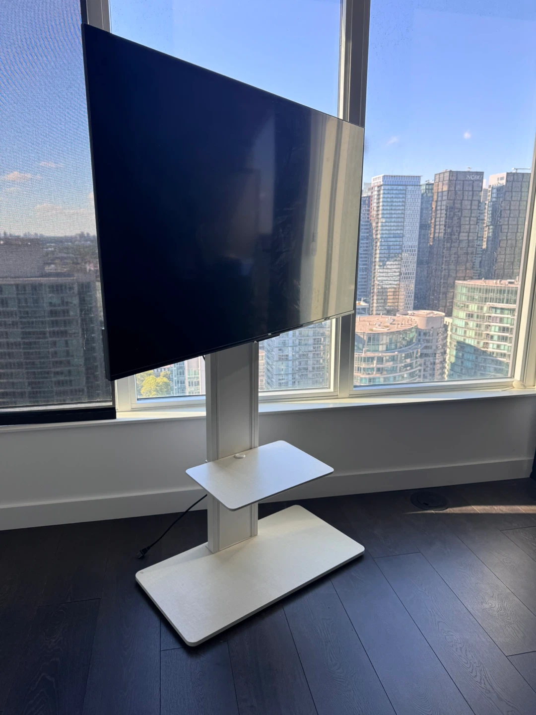 Moveable TV Stand with Mount for 32"-75" TVs - pickup only.