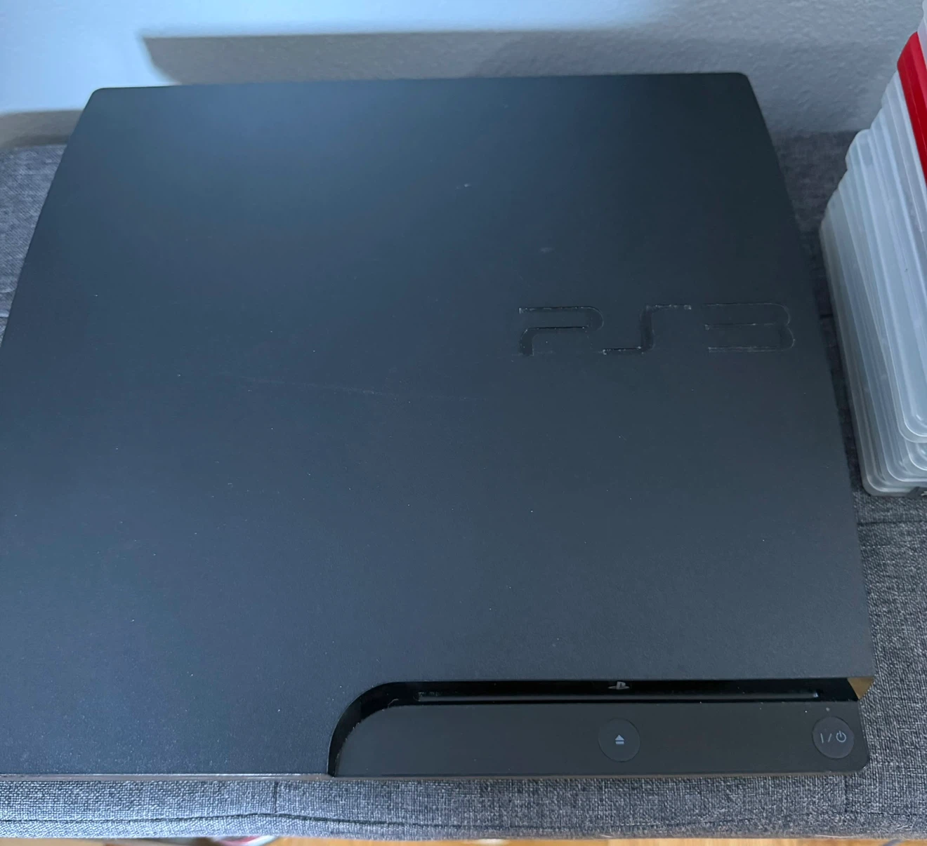 PlayStation 3 Console with Games and Controller