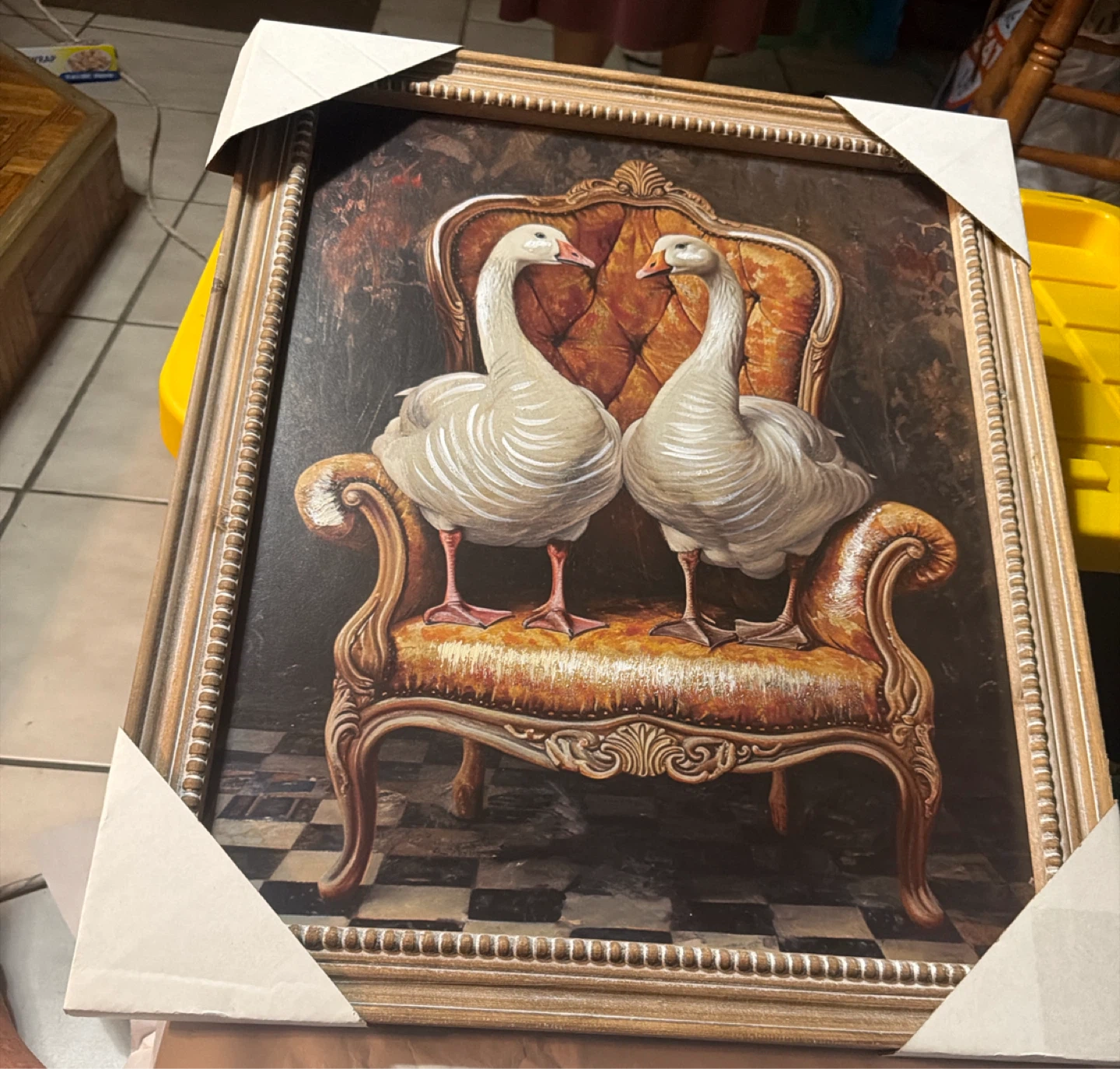 Framed Painting of Two Geese on a Chair