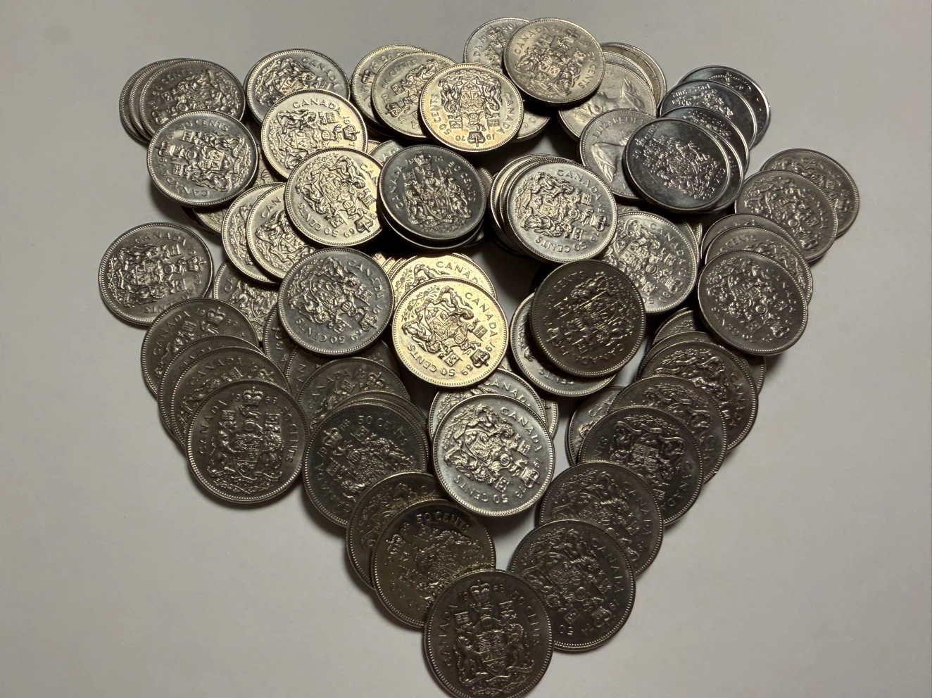 100 Assorted Canadian 50 Cent Coins