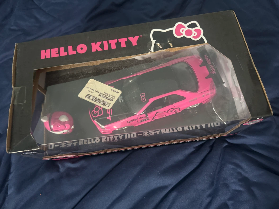 Hello Kitty & 2002 Nissan Skyline GT-R (BNR34) Diecast Model - photo 2