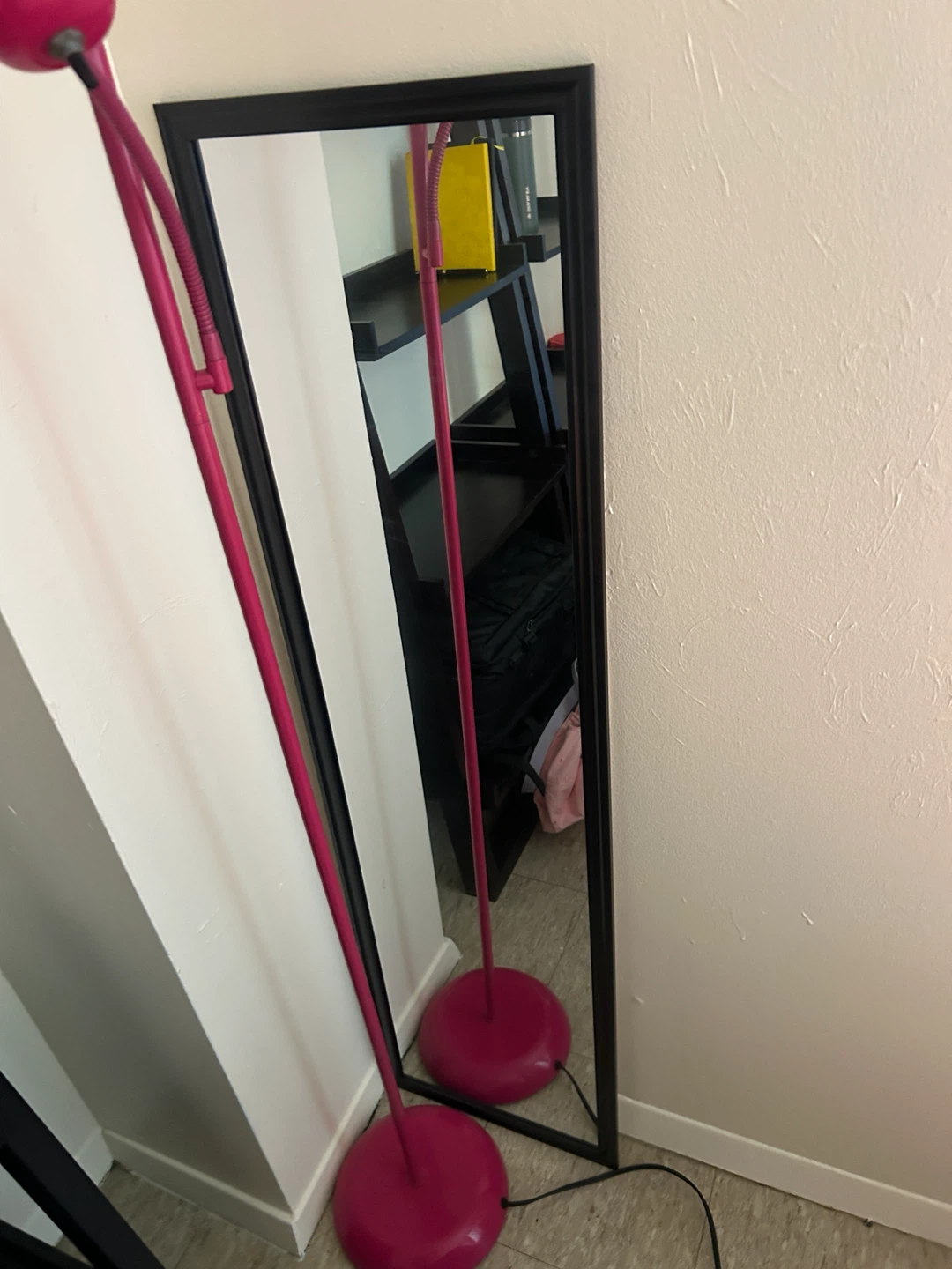 Standing mirror with black frame