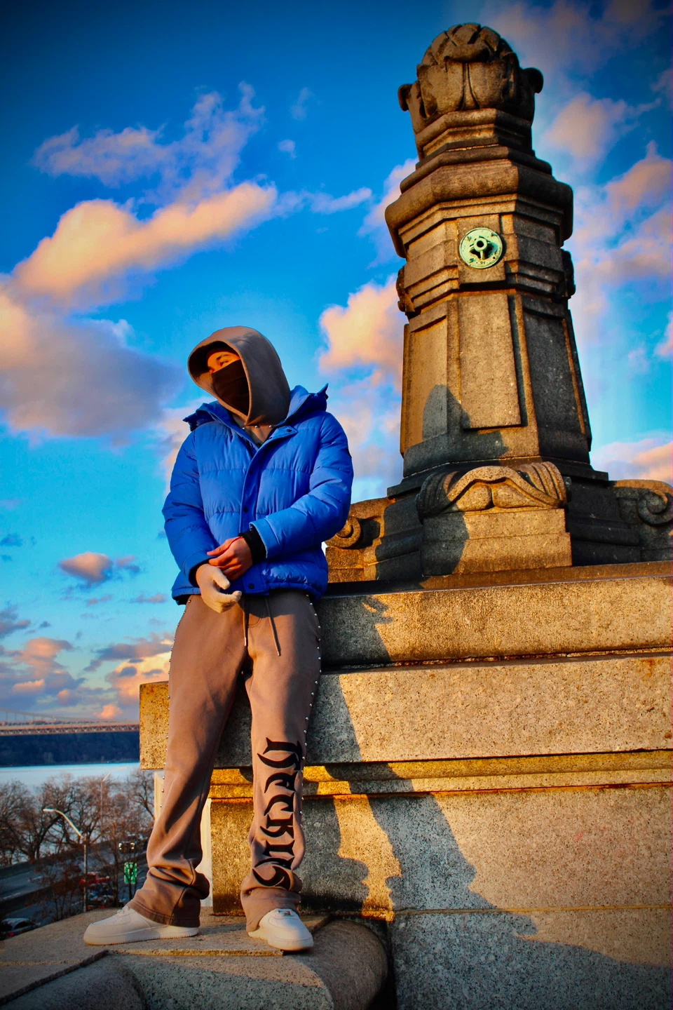 Blue Puffer Jacket and Grey Sweatpants