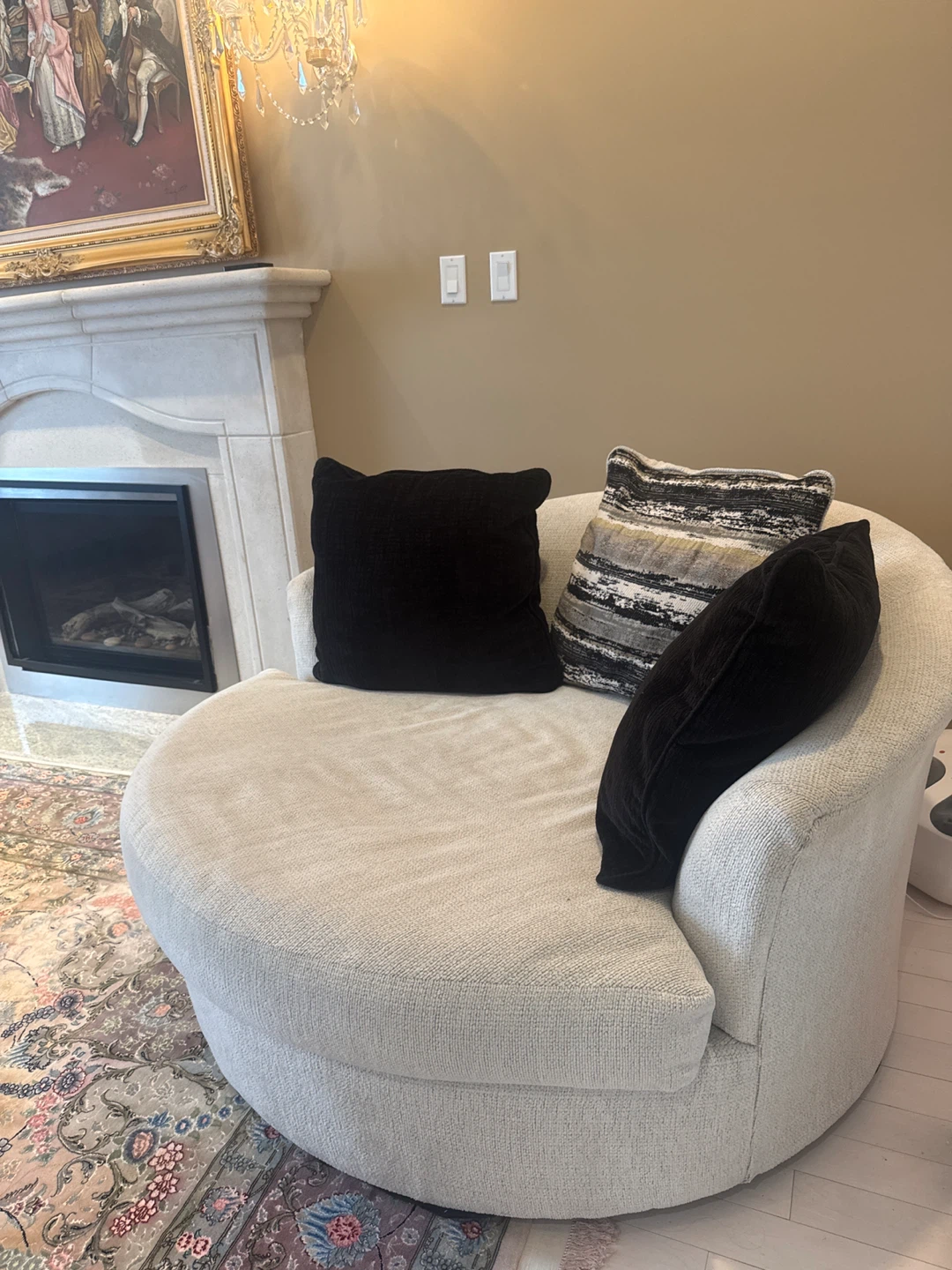 Ashly’s Cream Swivel Armchair with Black Accent Pillows - photo 3