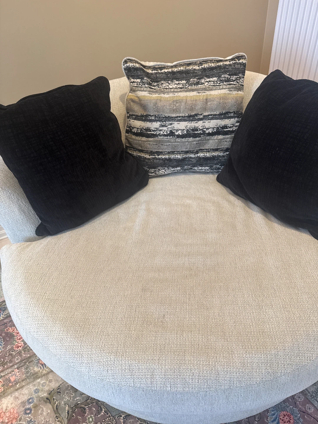 Ashly’s Cream Swivel Armchair with Black Accent Pillows - photo 4