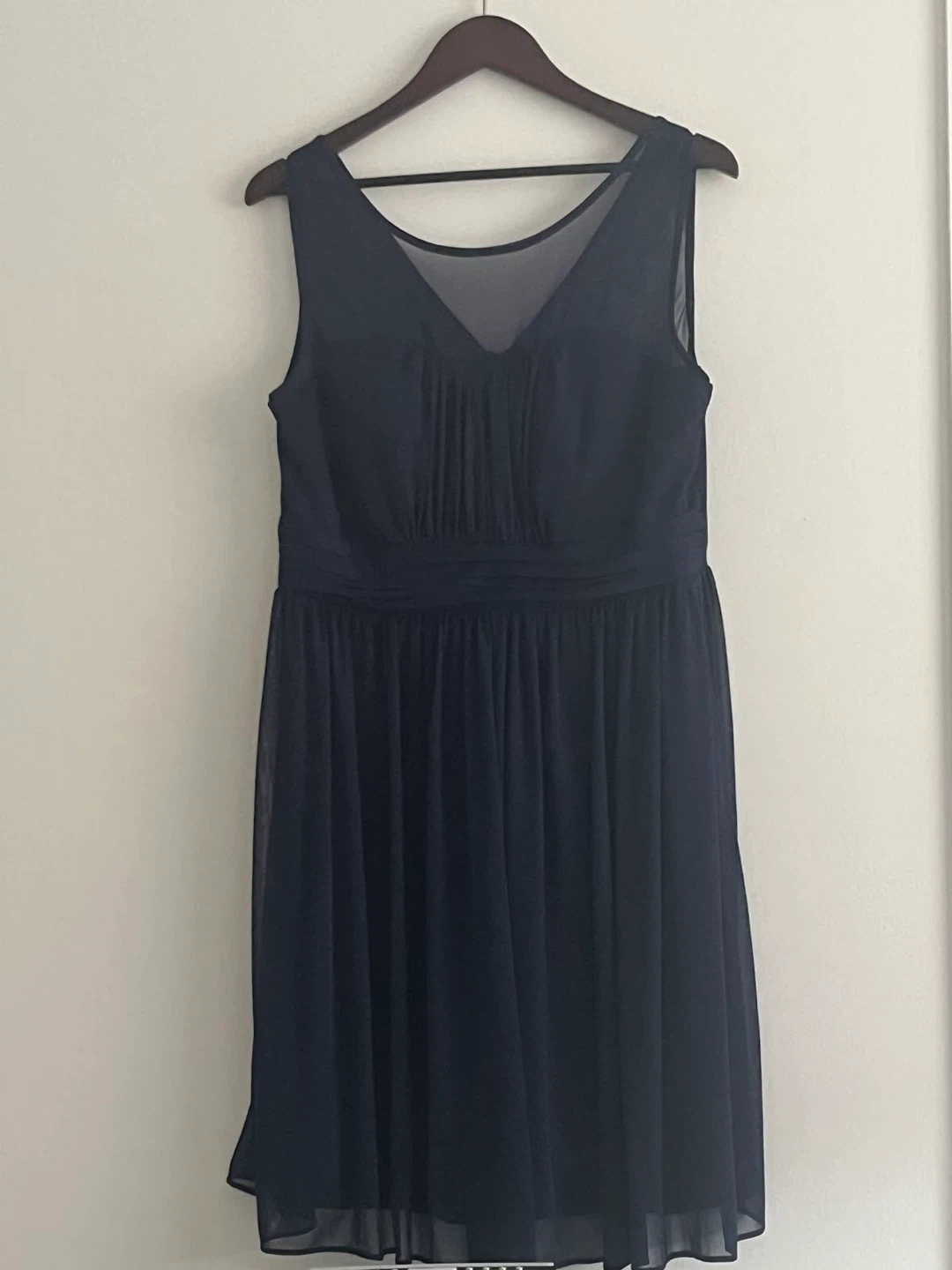 Navy blue sleeveless pleated dress