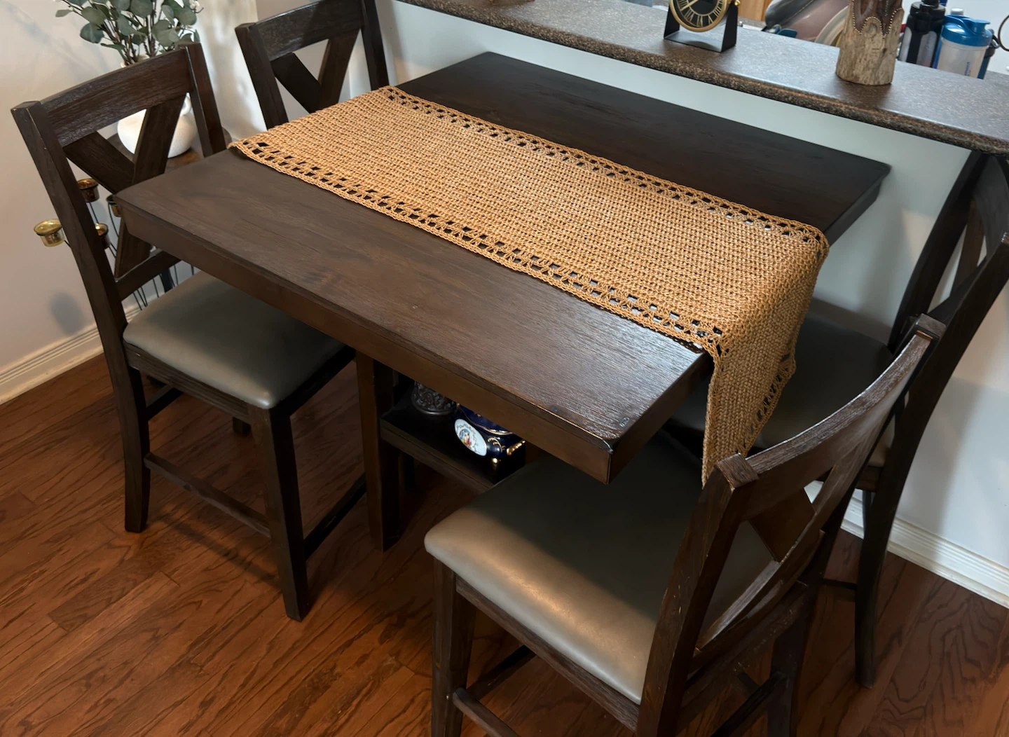 Wooden bar stool with grey seat