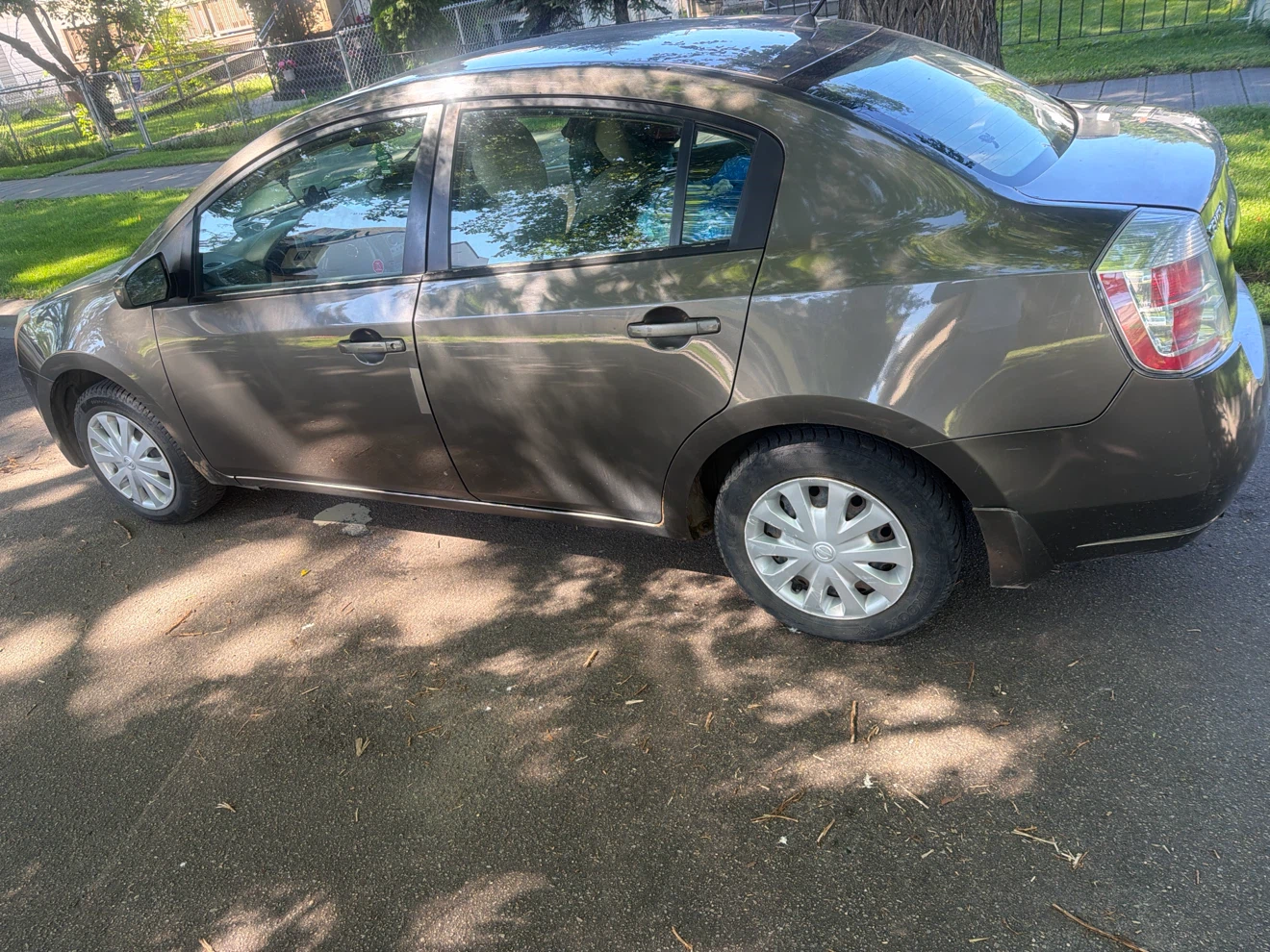 Grey Nissan Sentra sedan