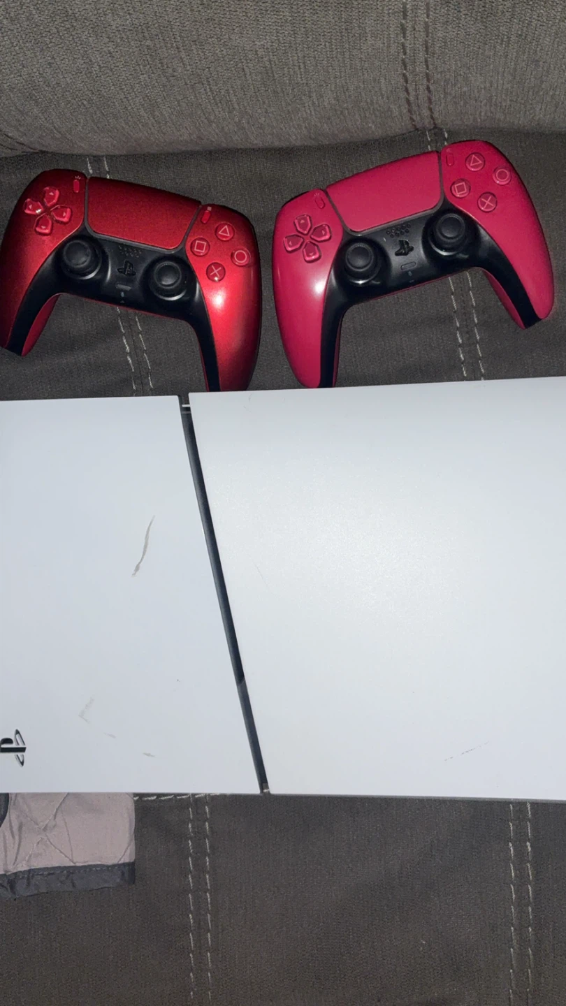PlayStation 5 Console with Red and Pink Controllers