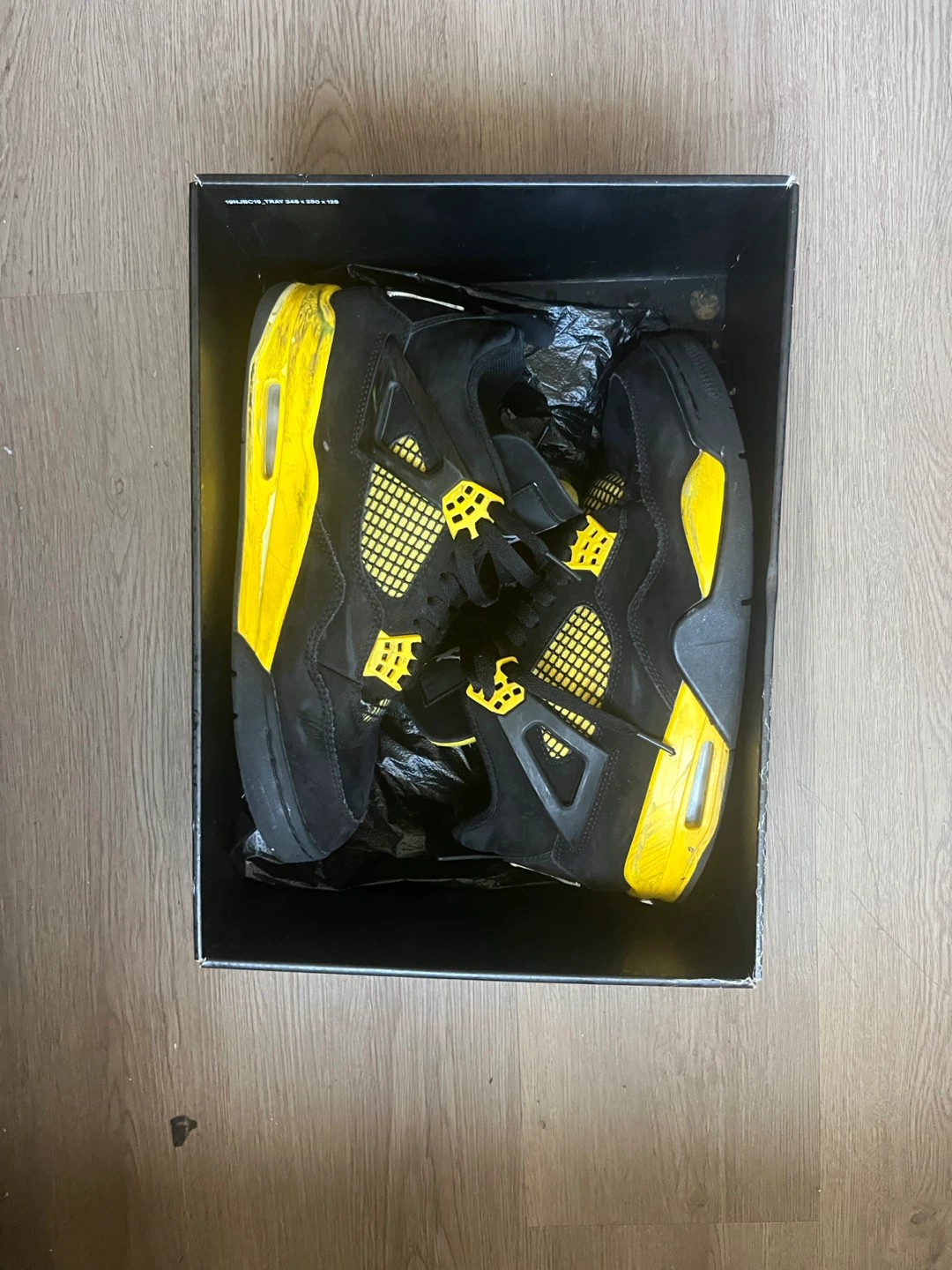 Air Jordan 4 "Lightning" Black/Tour Yellow
