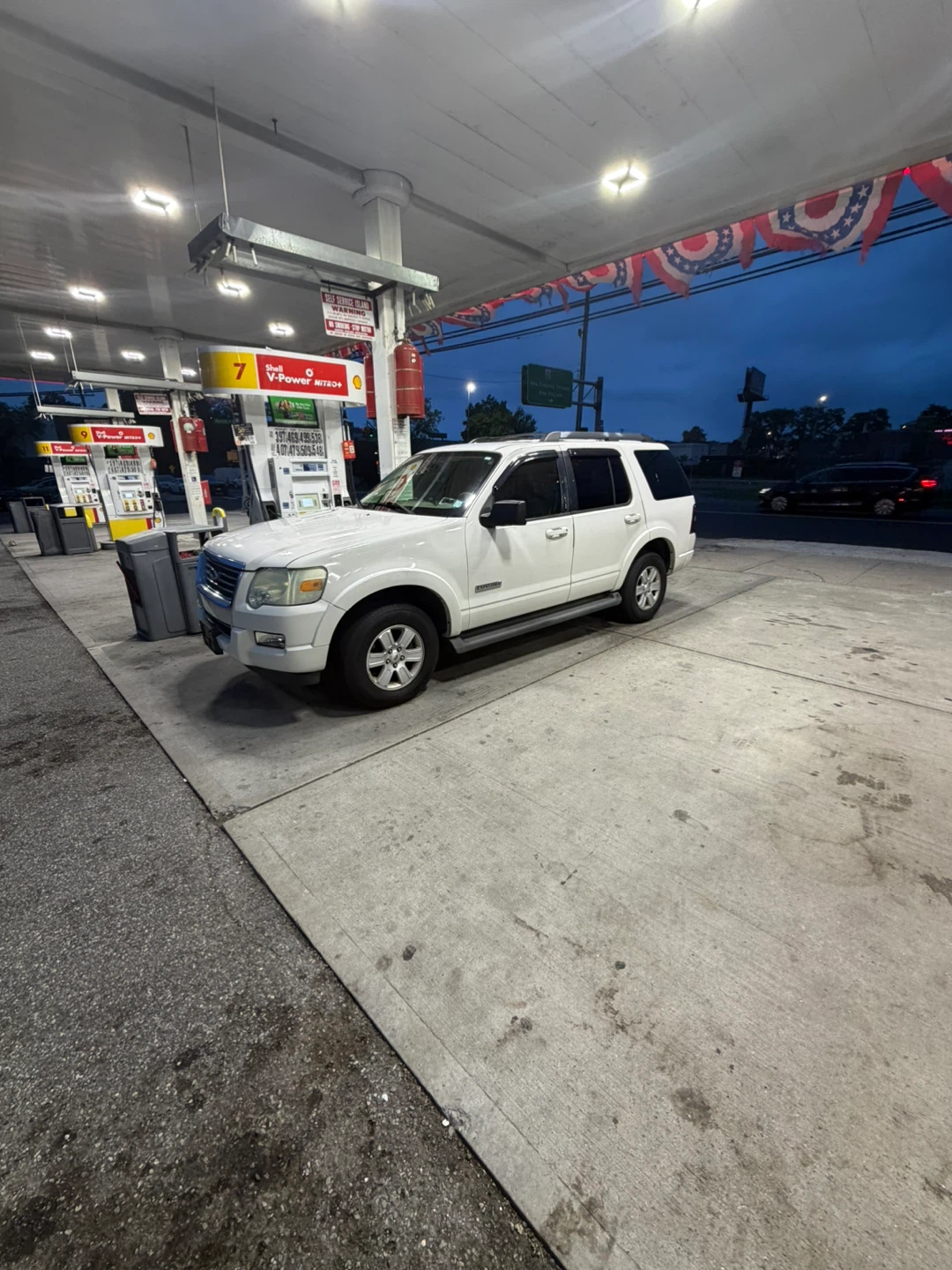 White Ford Explorer SUV - photo 3
