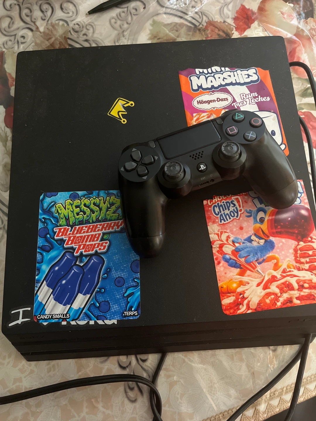PlayStation 4 Pro with Controller and Stickers