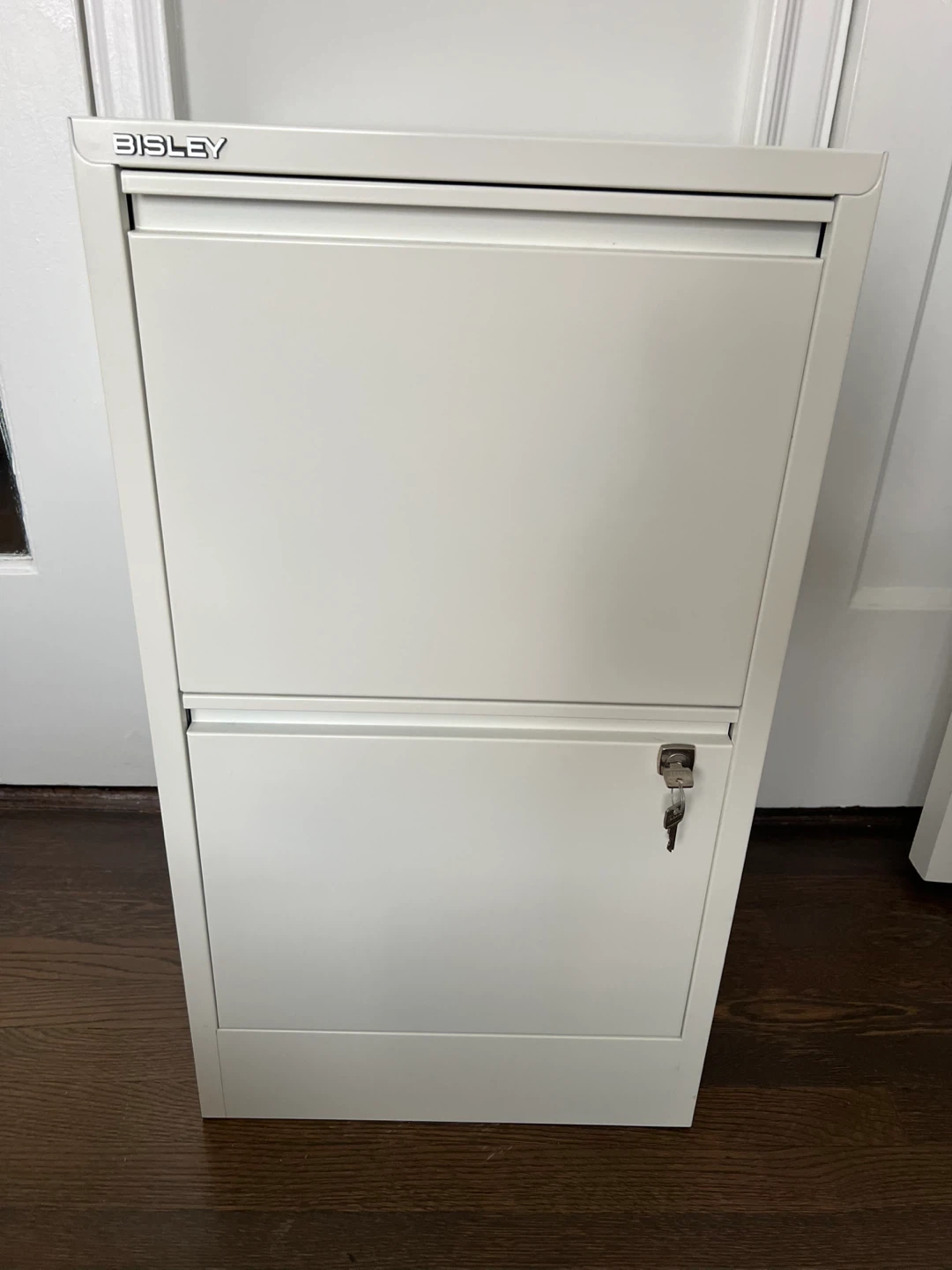 Bisley White 2 Drawer filing cabinet with lock.
