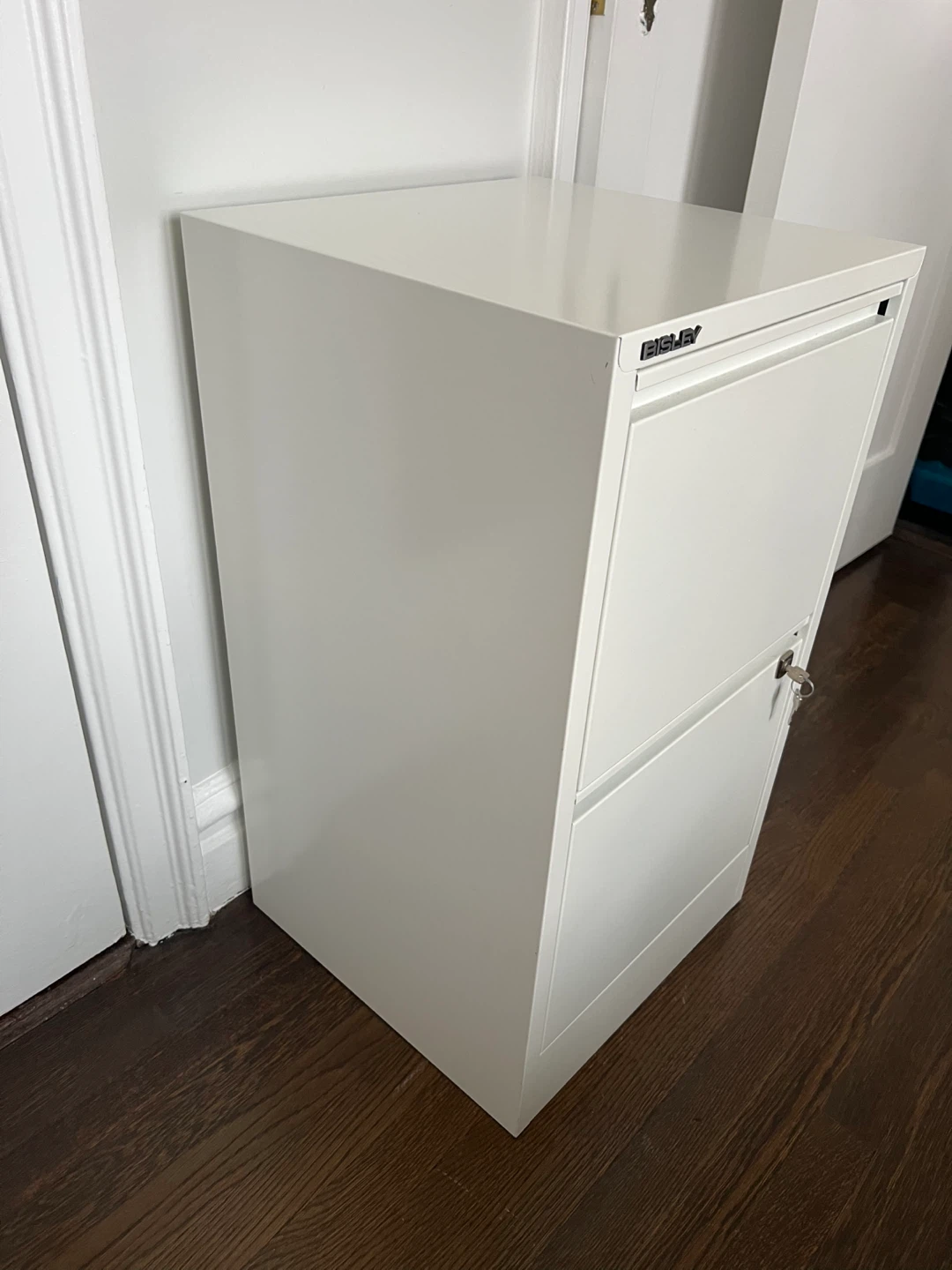 Bisley White 2 Drawer filing cabinet with lock. - photo 2