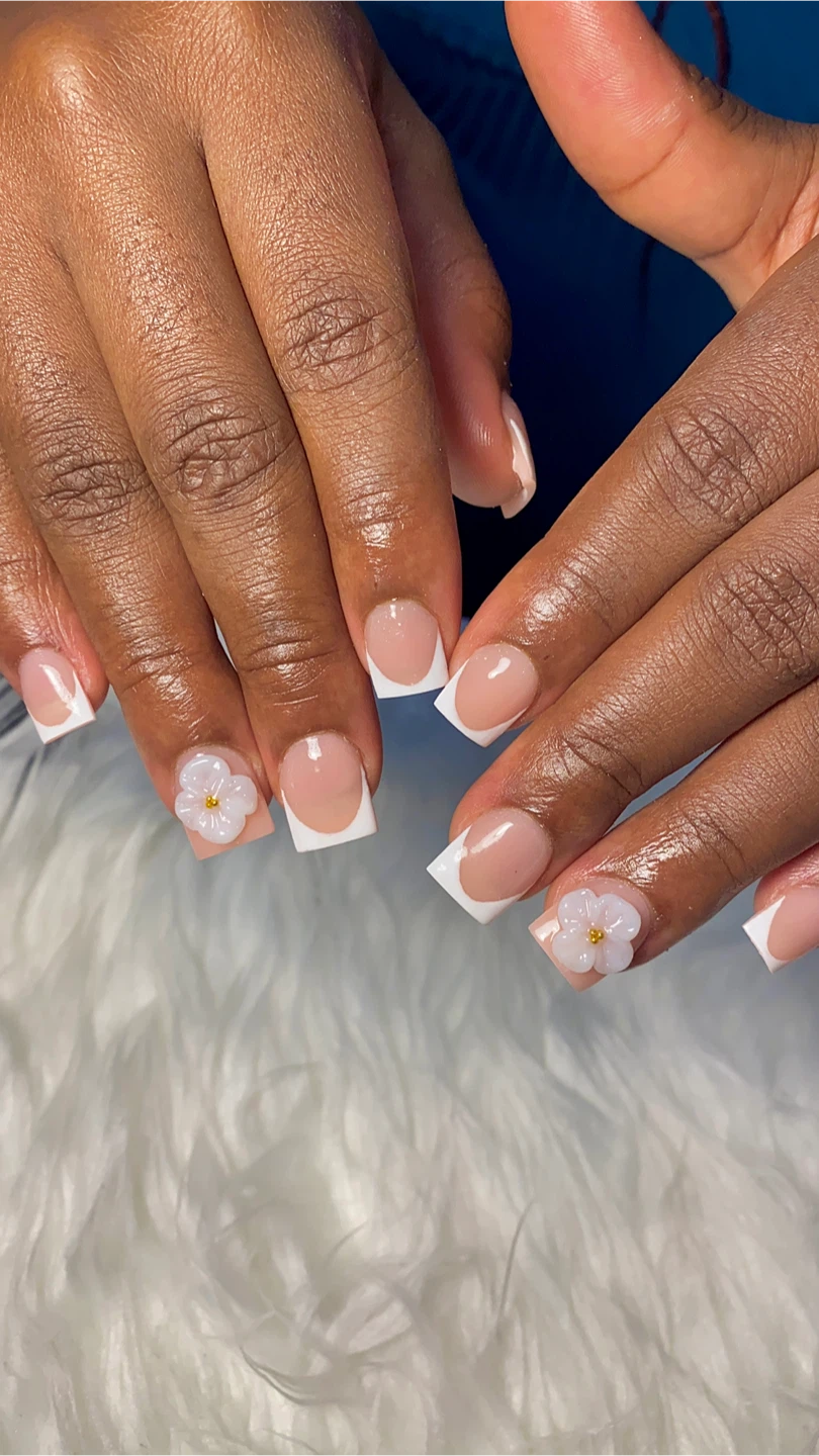 French tip acrylic nails with 3D flower detail