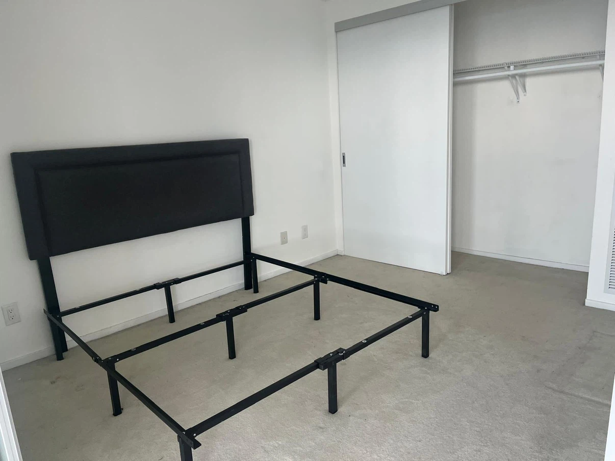 Black Upholstered Headboard and Metal Bed Frame