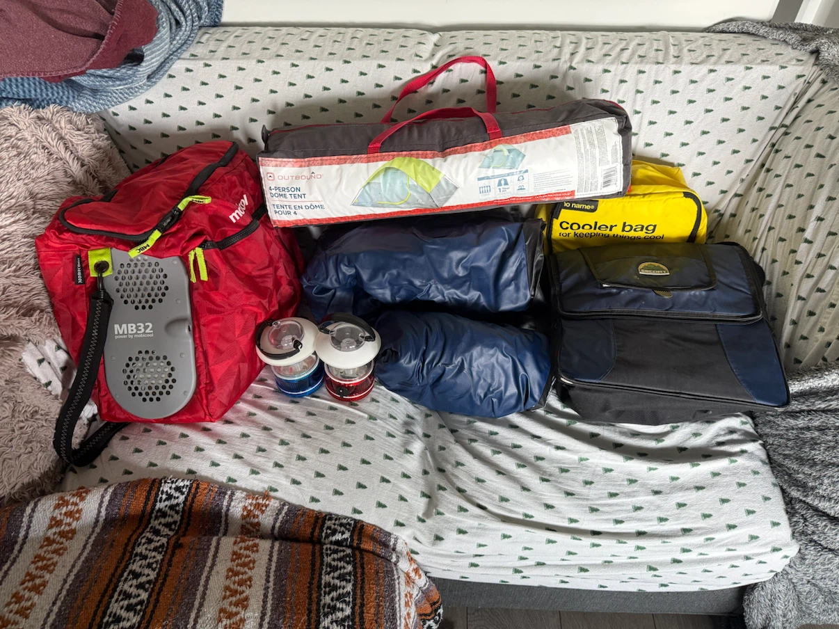 Camping gear set with Outbound 4-person tent and Coleman cooler