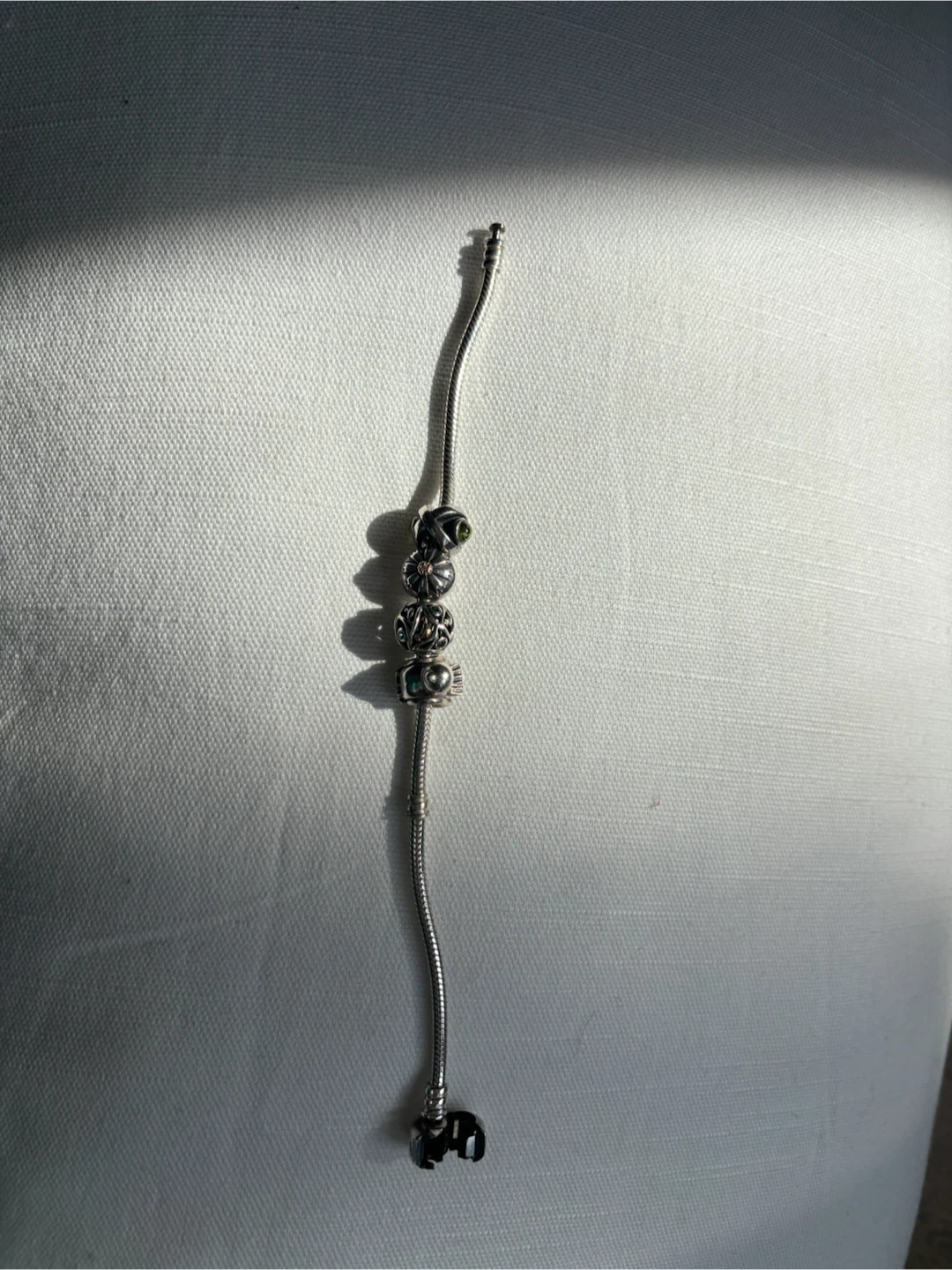 Silver Pandora bracelet with four charms - photo 2