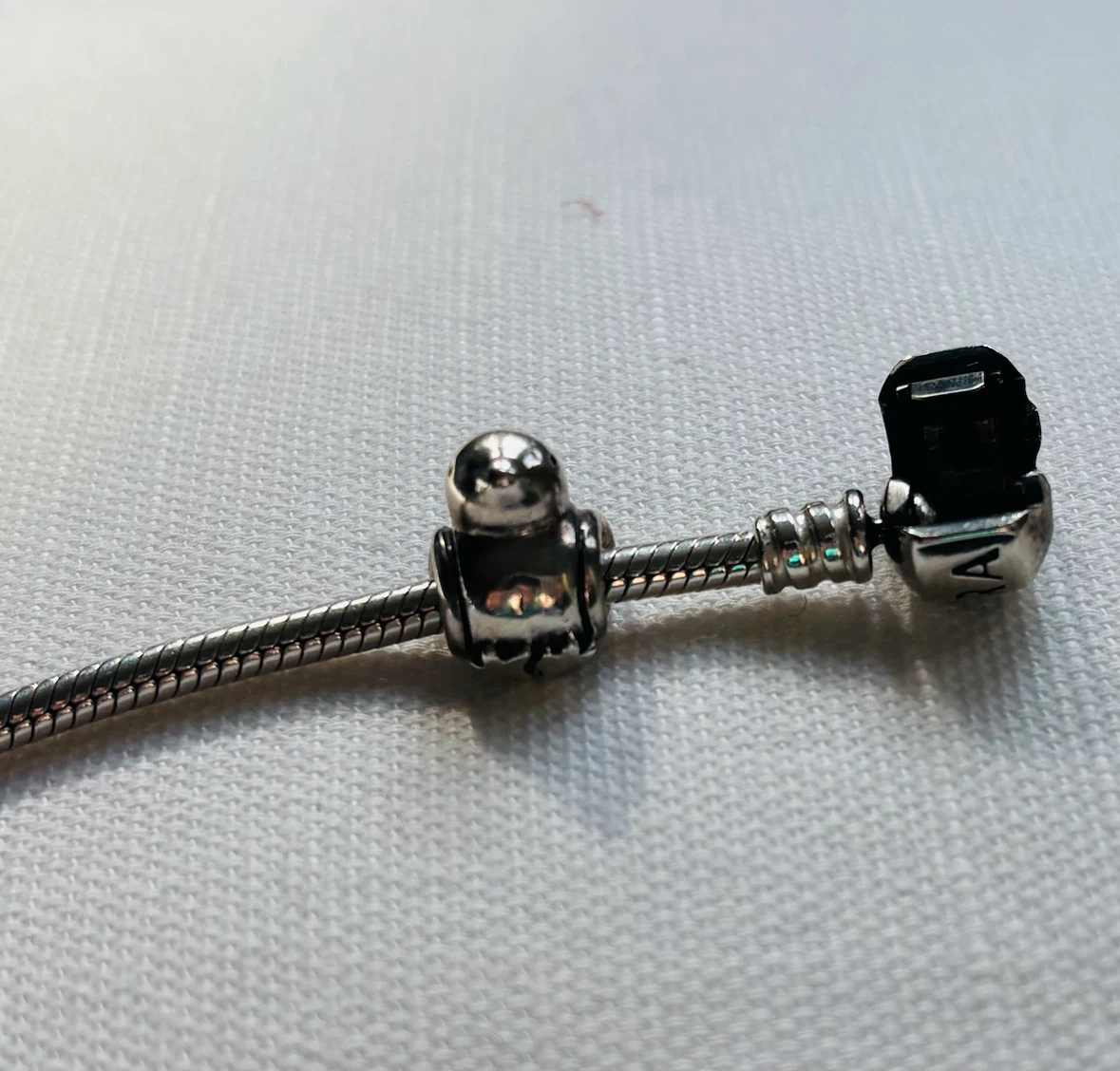 Silver Pandora bracelet with four charms - photo 4