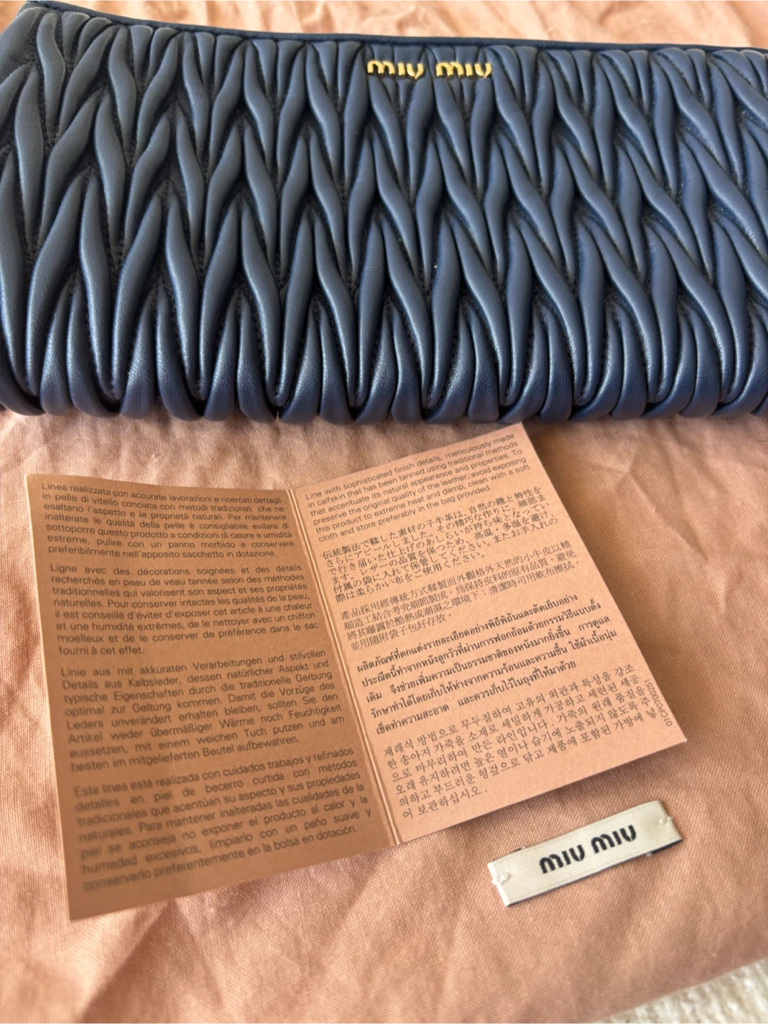 Miu Miu Matelassé Clutch Navy Leather - photo 2