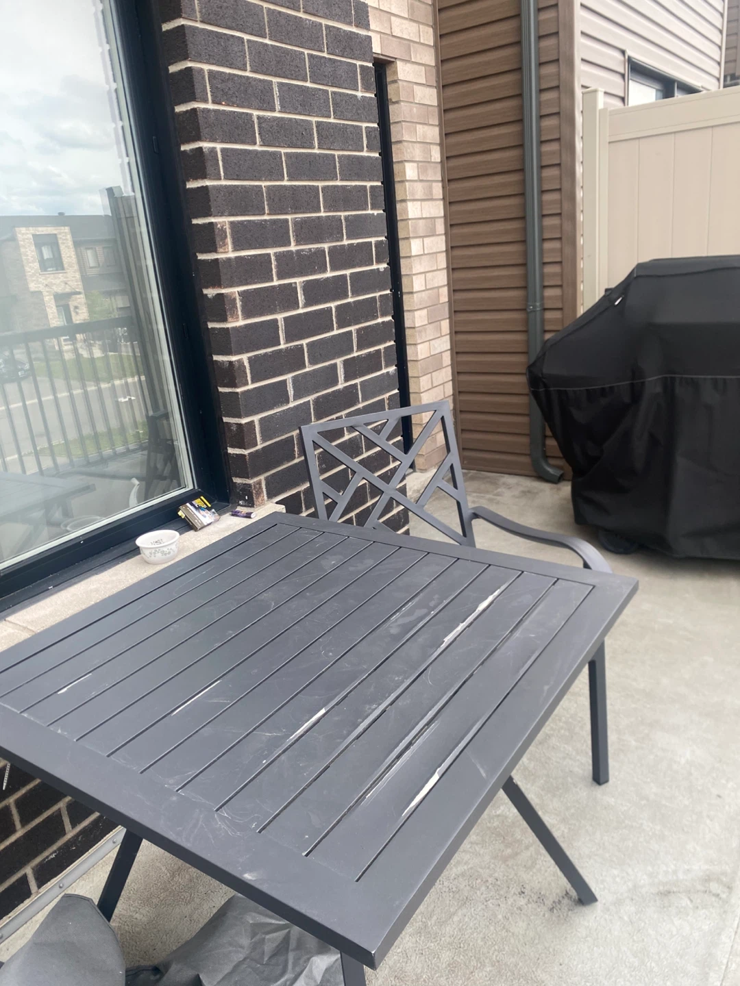 Grey Metal Outdoor Patio Table Chair set with seat covers