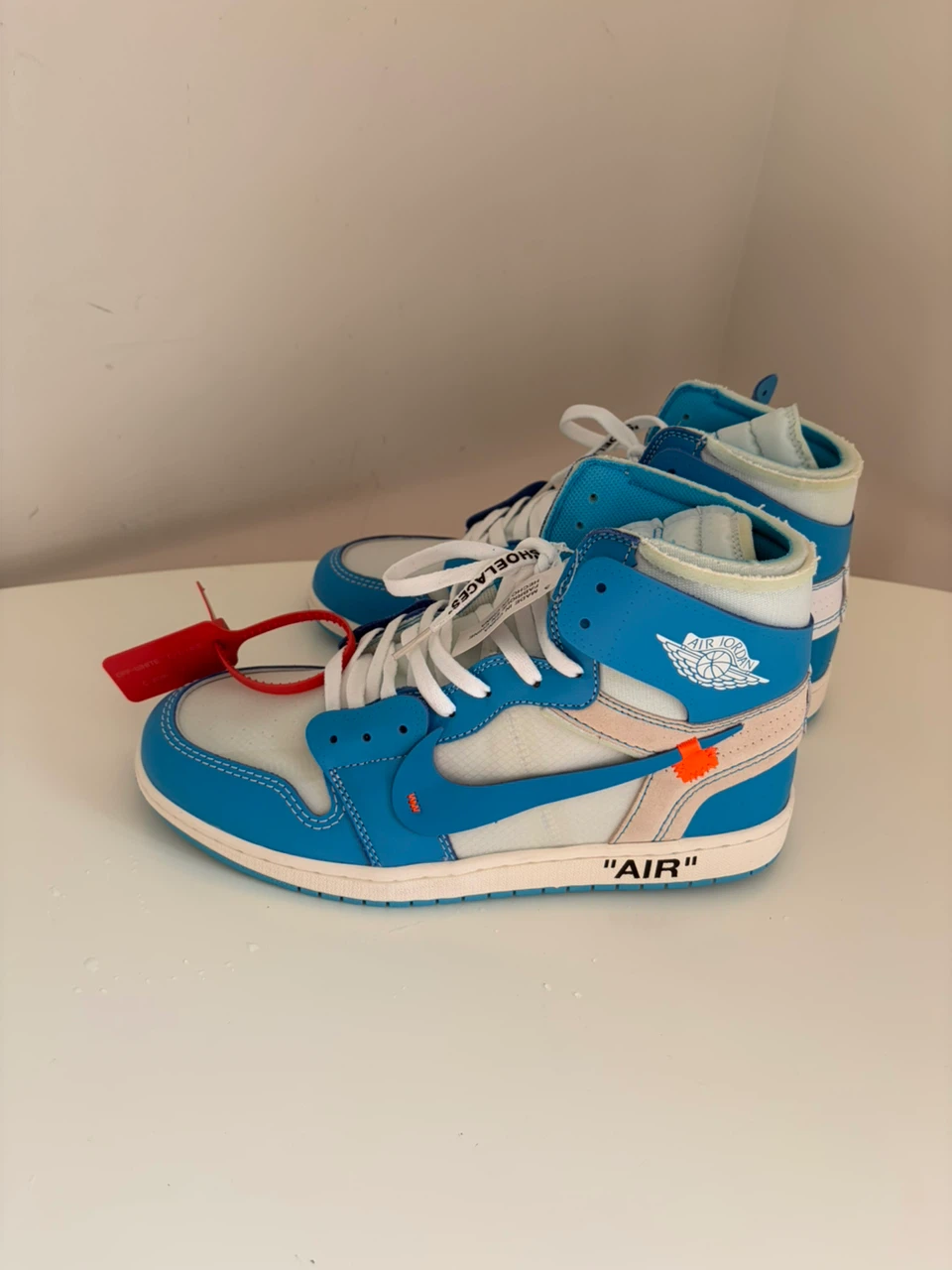 Off-White x Air Jordan 1 UNC Sneakers - photo 4