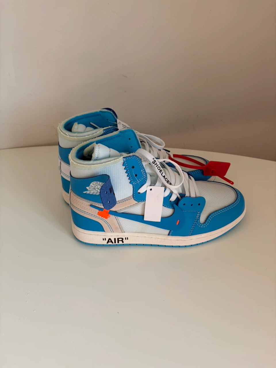 Off-White x Air Jordan 1 UNC Sneakers - photo 5