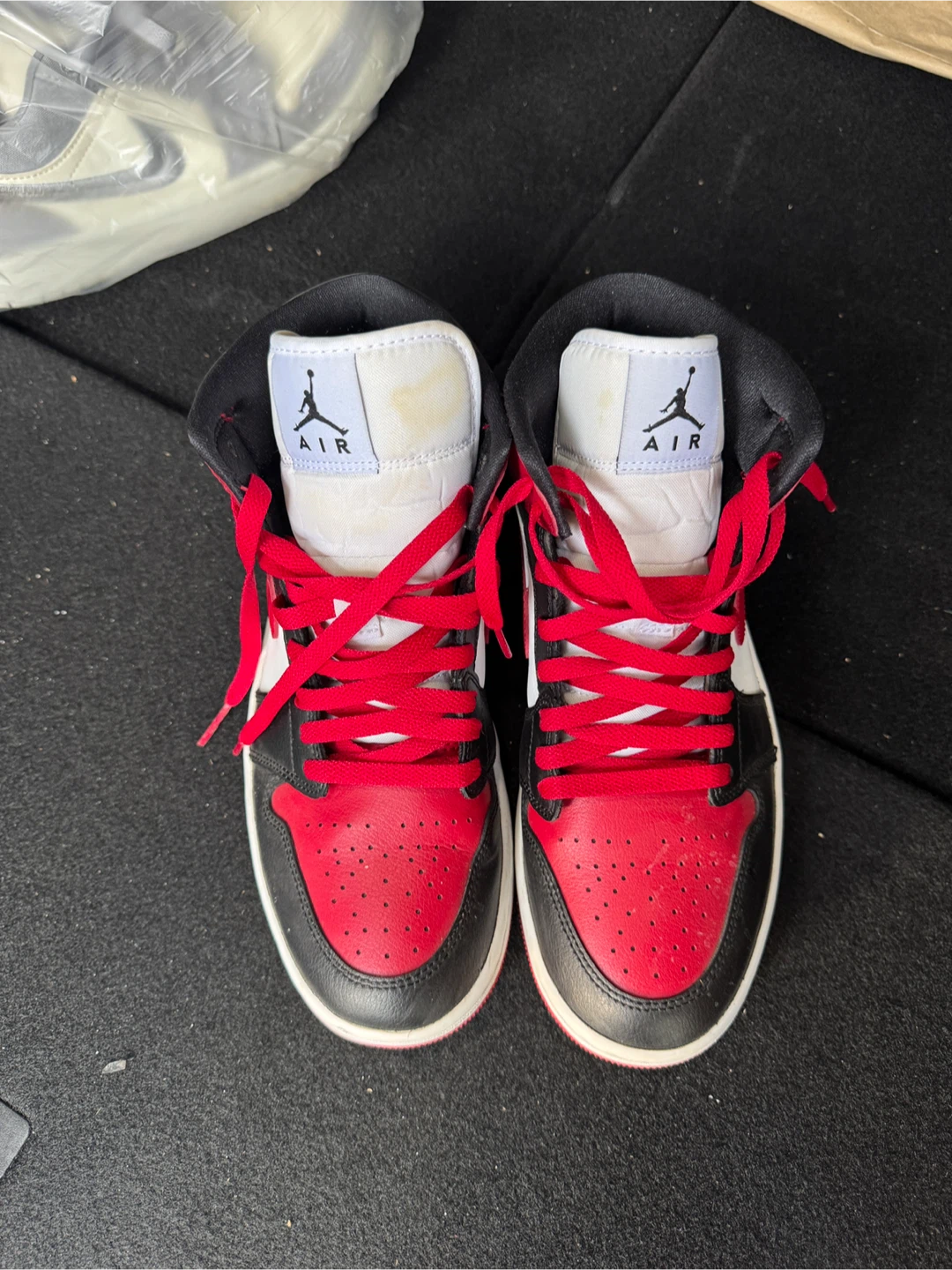 Air Jordan 1 Mid Red Black White Sneakers