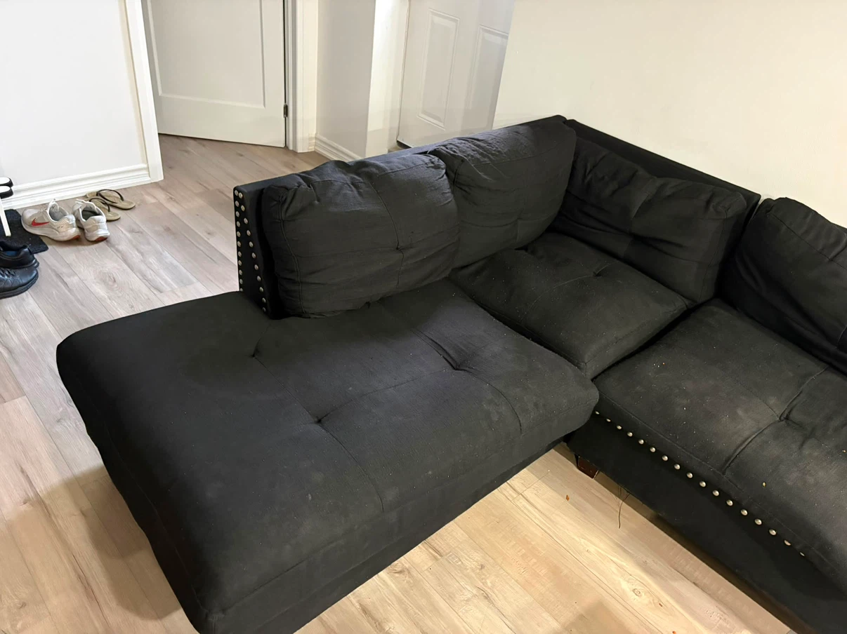 Black Sectional Sofa with Studded Accents