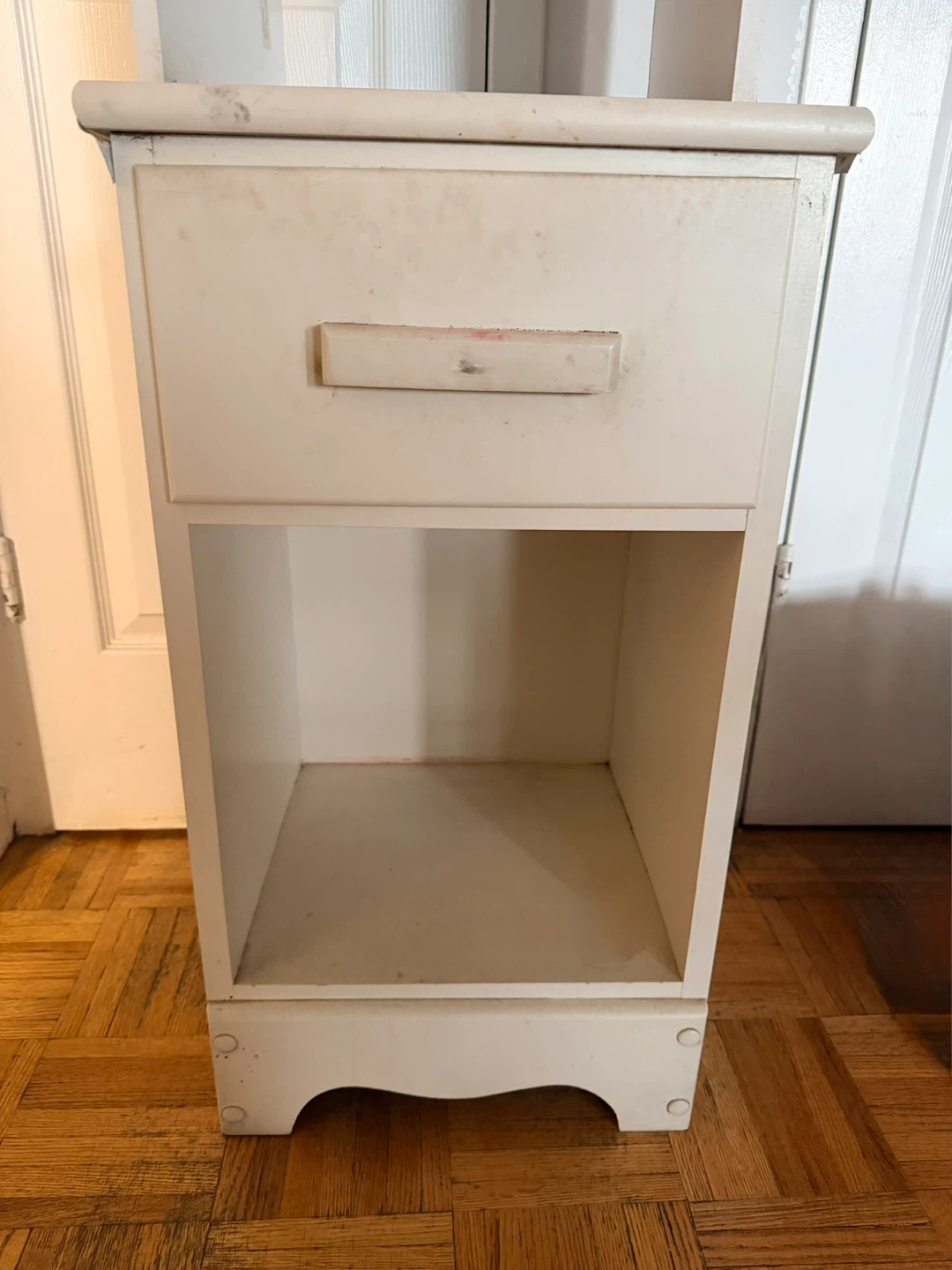 White bedside table with drawer and shelf