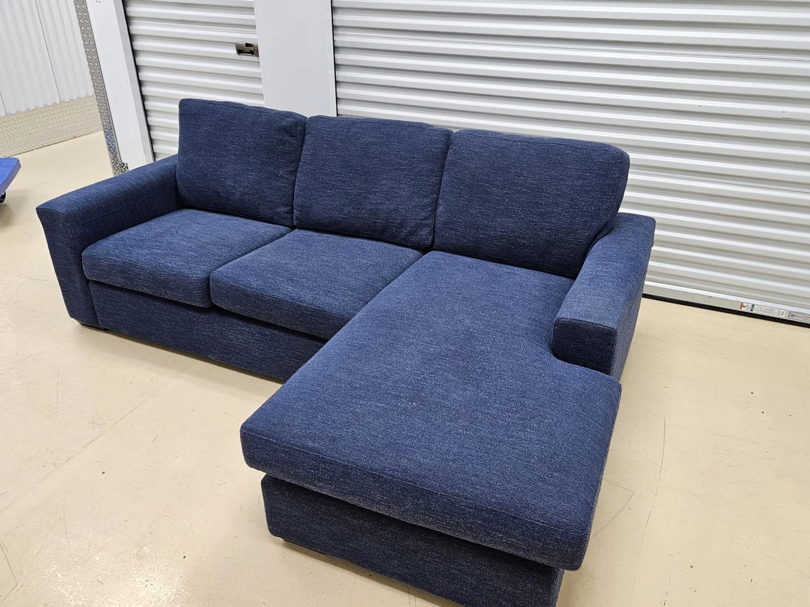 Blue sectional sofa with right-hand chaise