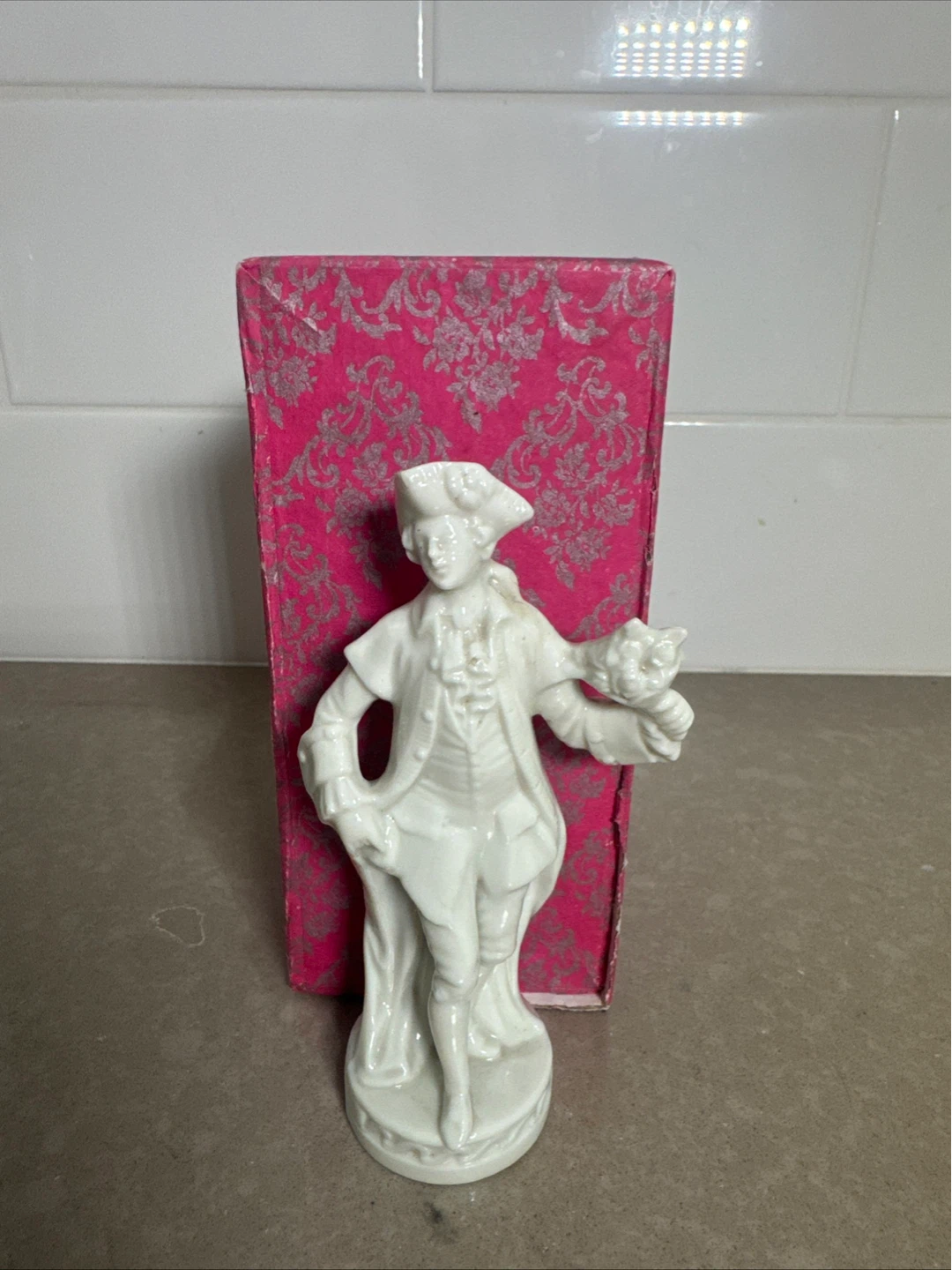 Porcelain Figurine Man with Flowers